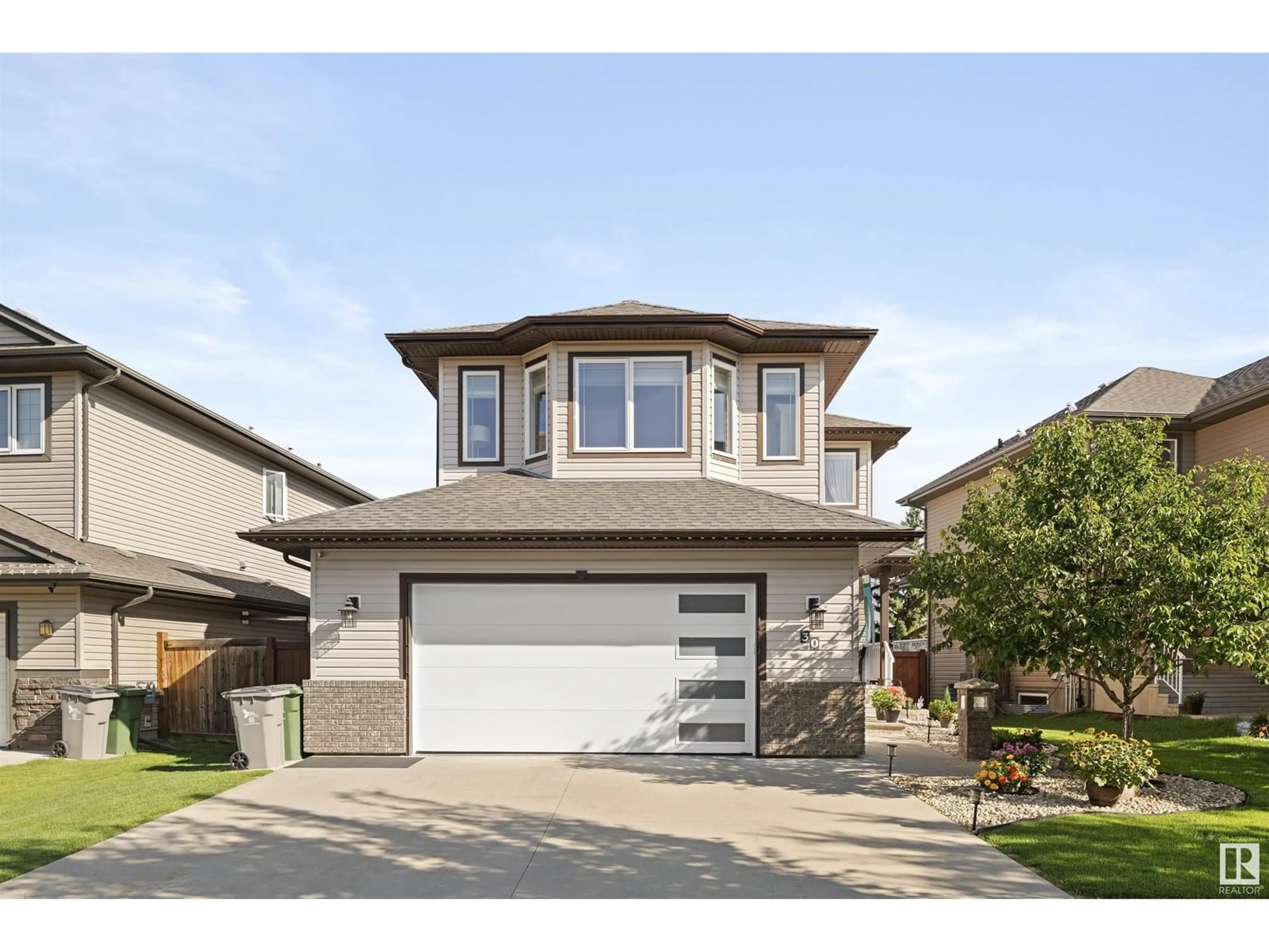 Home with vinyl exterior material, street for 30 RUE BLANCHARD, Beaumont Alberta T4X0E6