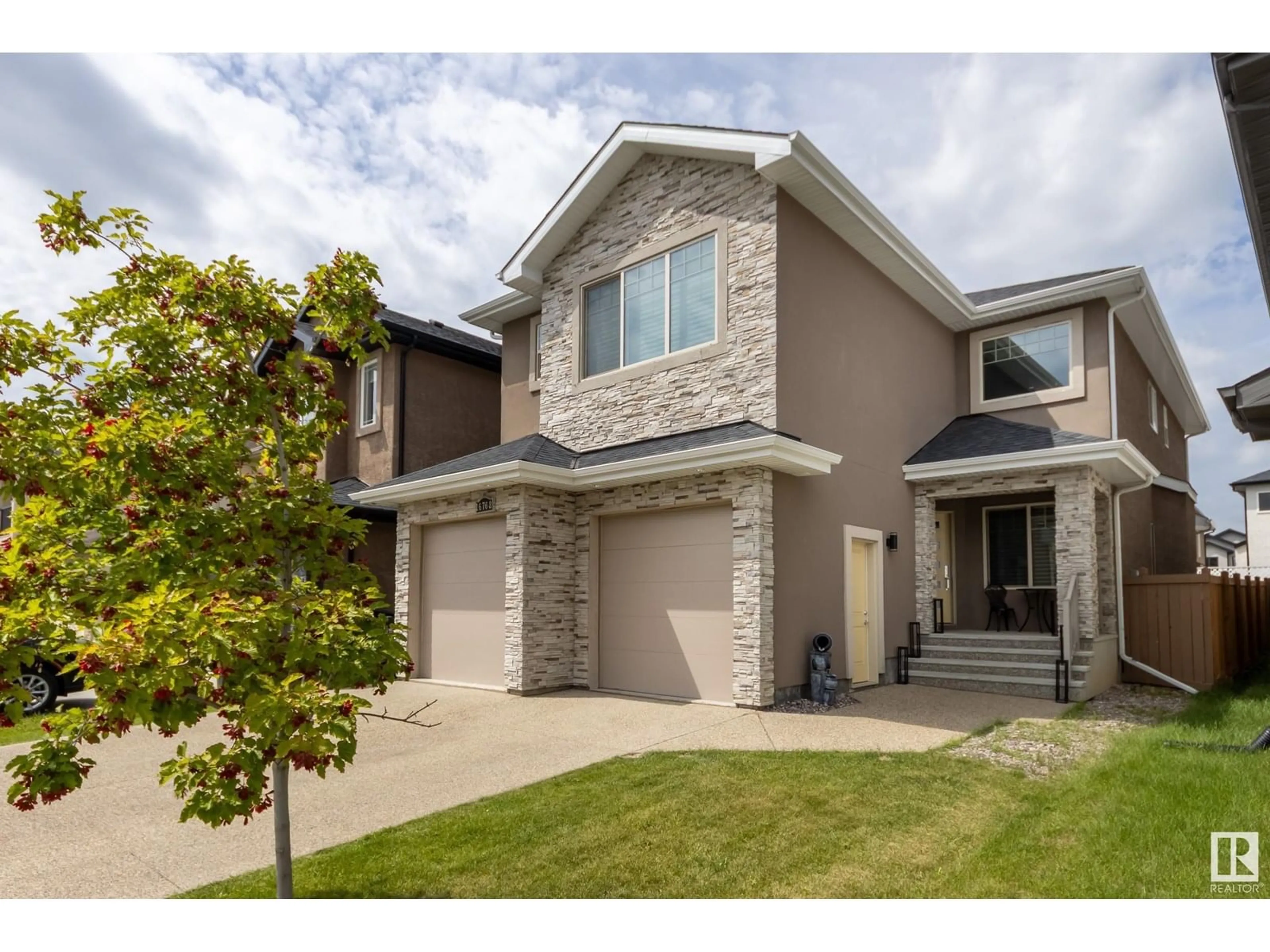 Home with brick exterior material, street for NW - 16768 61 ST, Edmonton Alberta T5Y3S5
