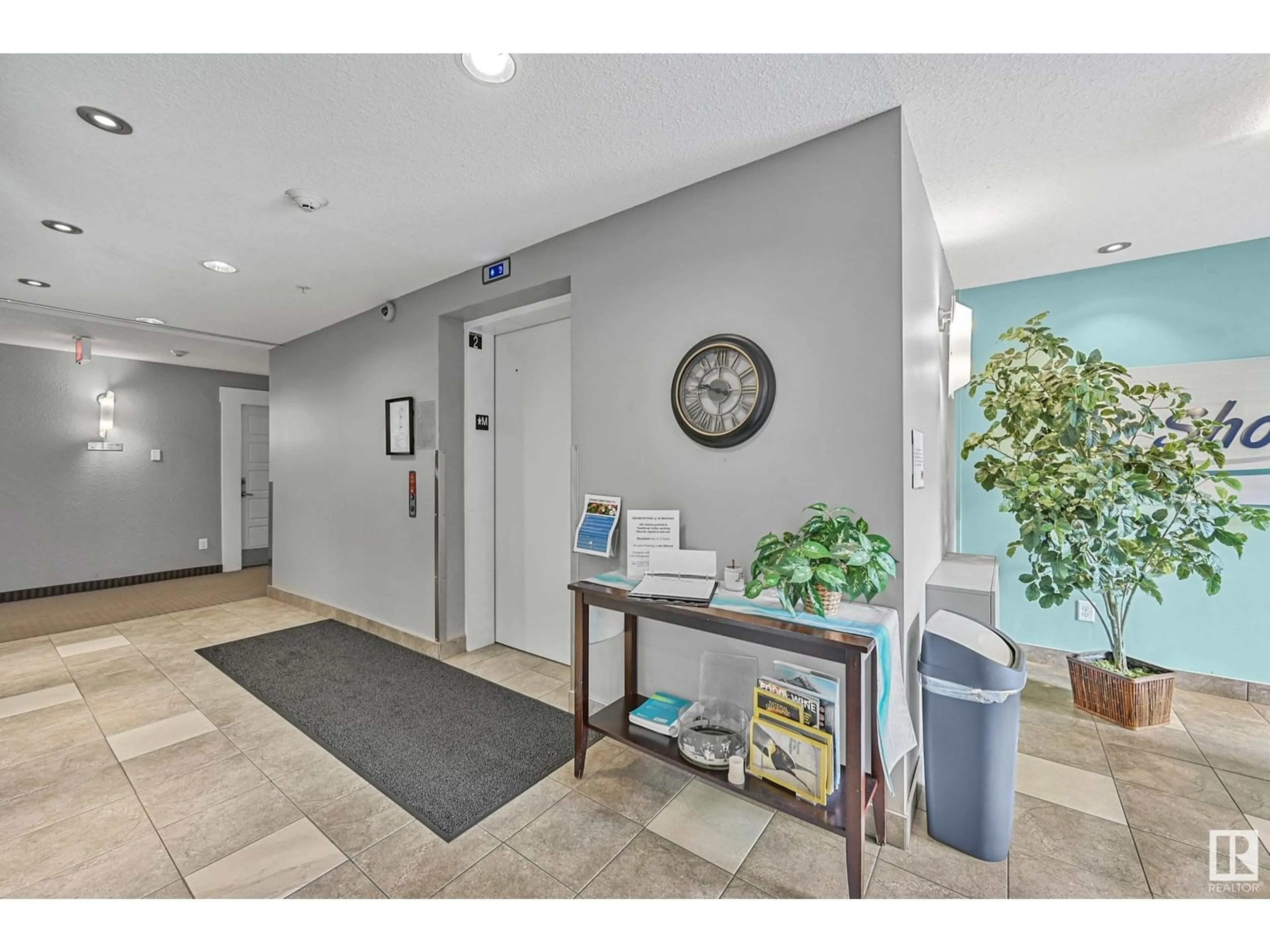 Indoor foyer for 6076 - 335 SCHONSEE WY, Edmonton Alberta T5Z0K8