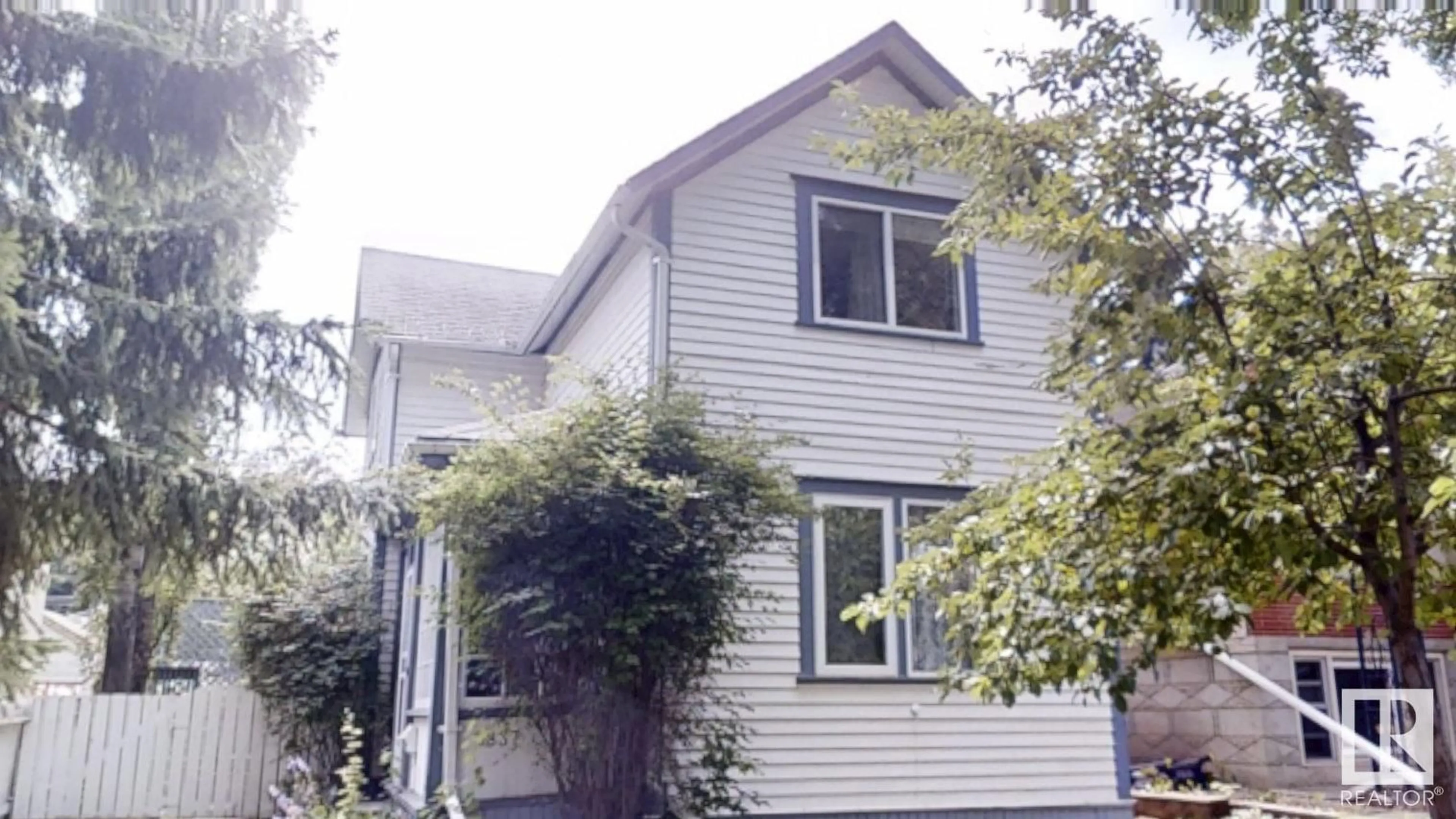 Home with vinyl exterior material, building for NW - 9837 85 AV, Edmonton Alberta T6E2J5