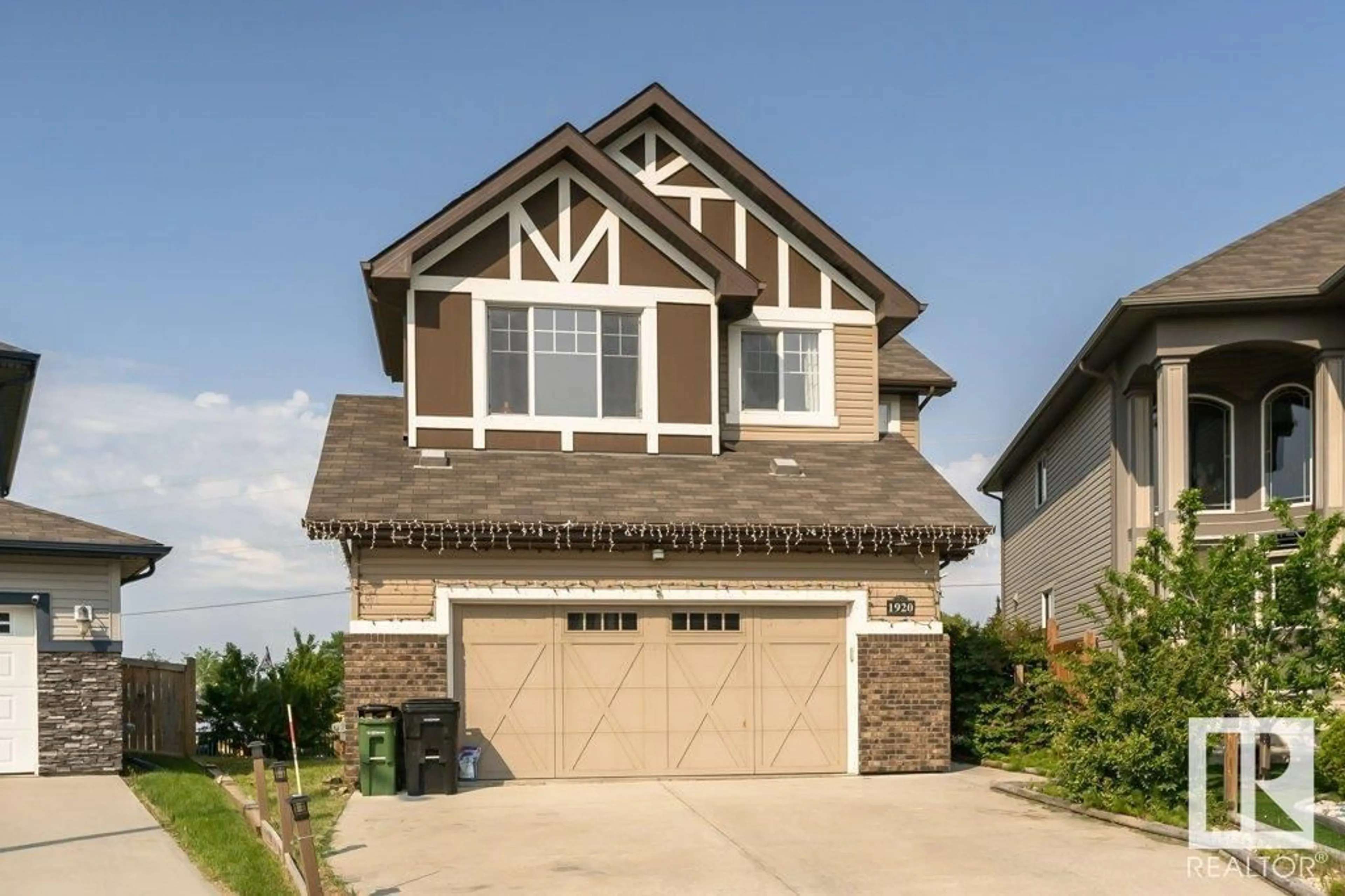 Home with vinyl exterior material, street for NW - 1920 33B ST, Edmonton Alberta T6T0L3