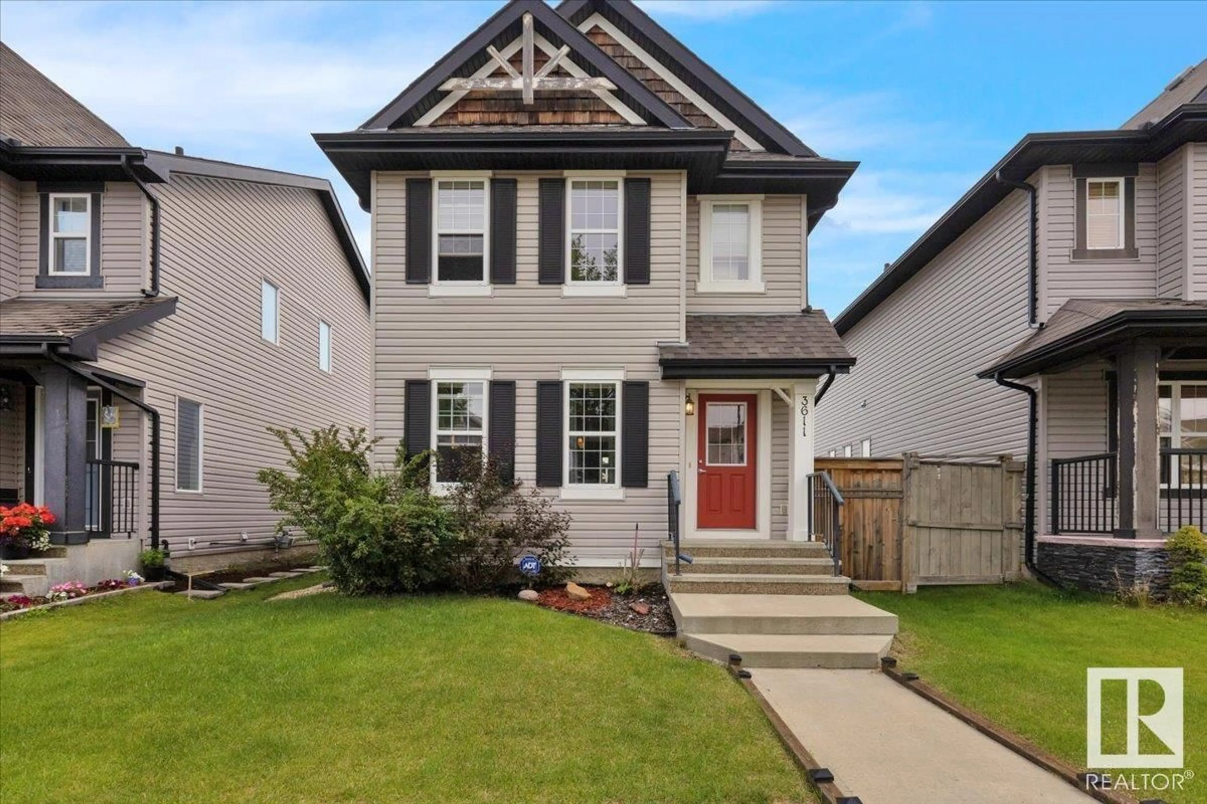 Home with vinyl exterior material, street for 3611 13 ST, Edmonton Alberta T6T0J4