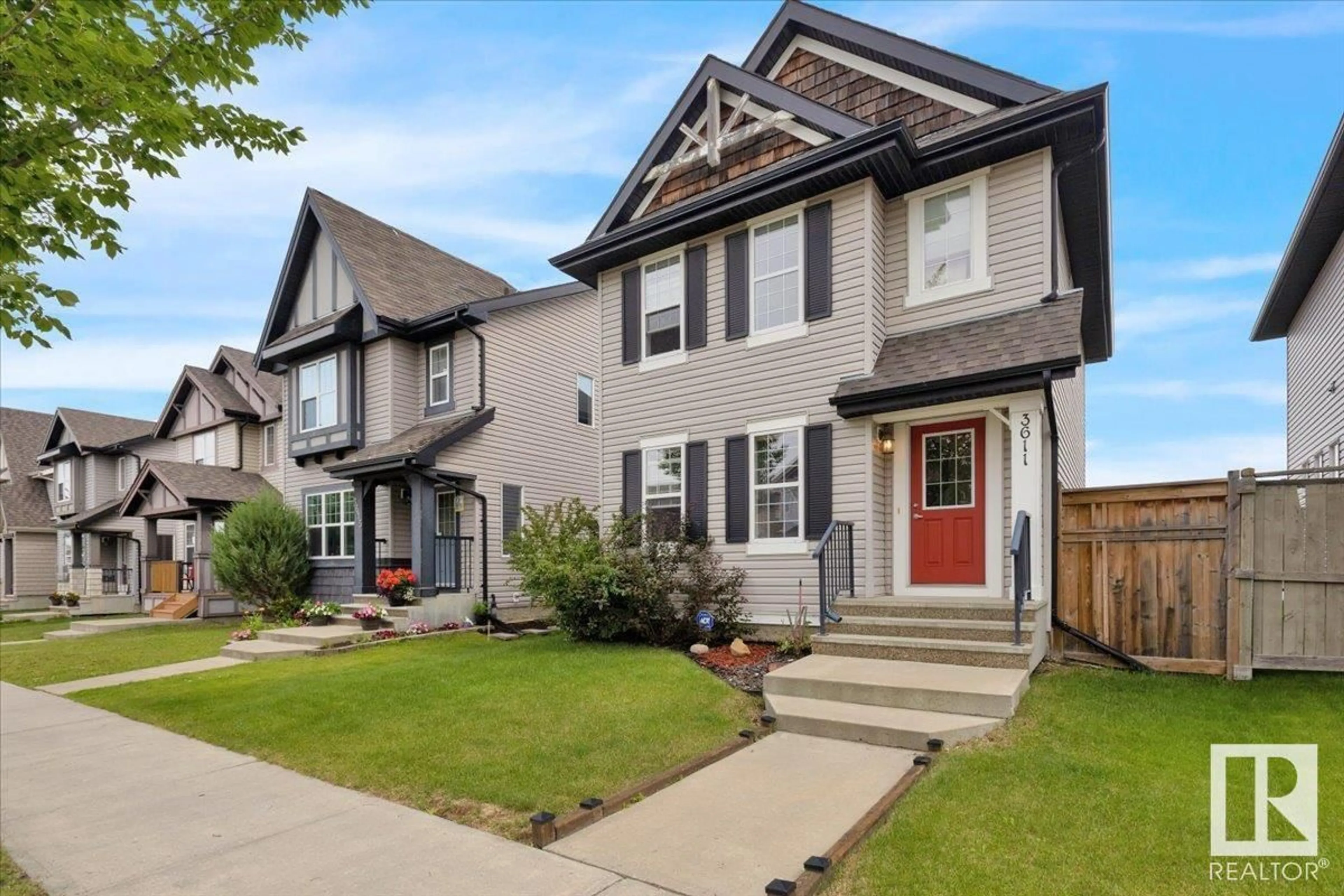 Home with vinyl exterior material, street for 3611 13 ST, Edmonton Alberta T6T0J4