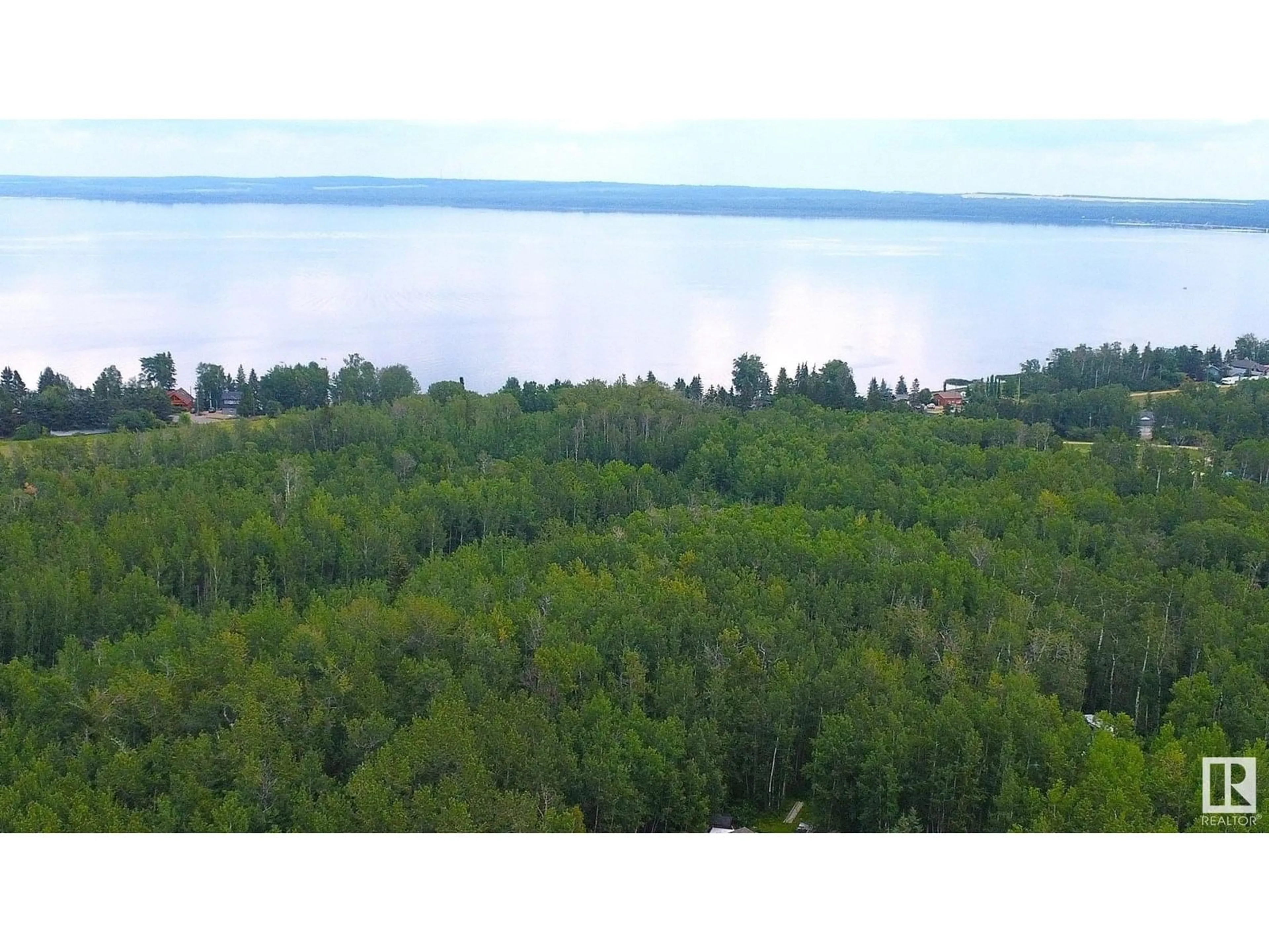 A pic from outside/outdoor area/front of a property/back of a property/a pic from drone, water/lake/river/ocean view for 636 462014 RGE ROAD 10, Rural Wetaskiwin County Alberta T0C2V0