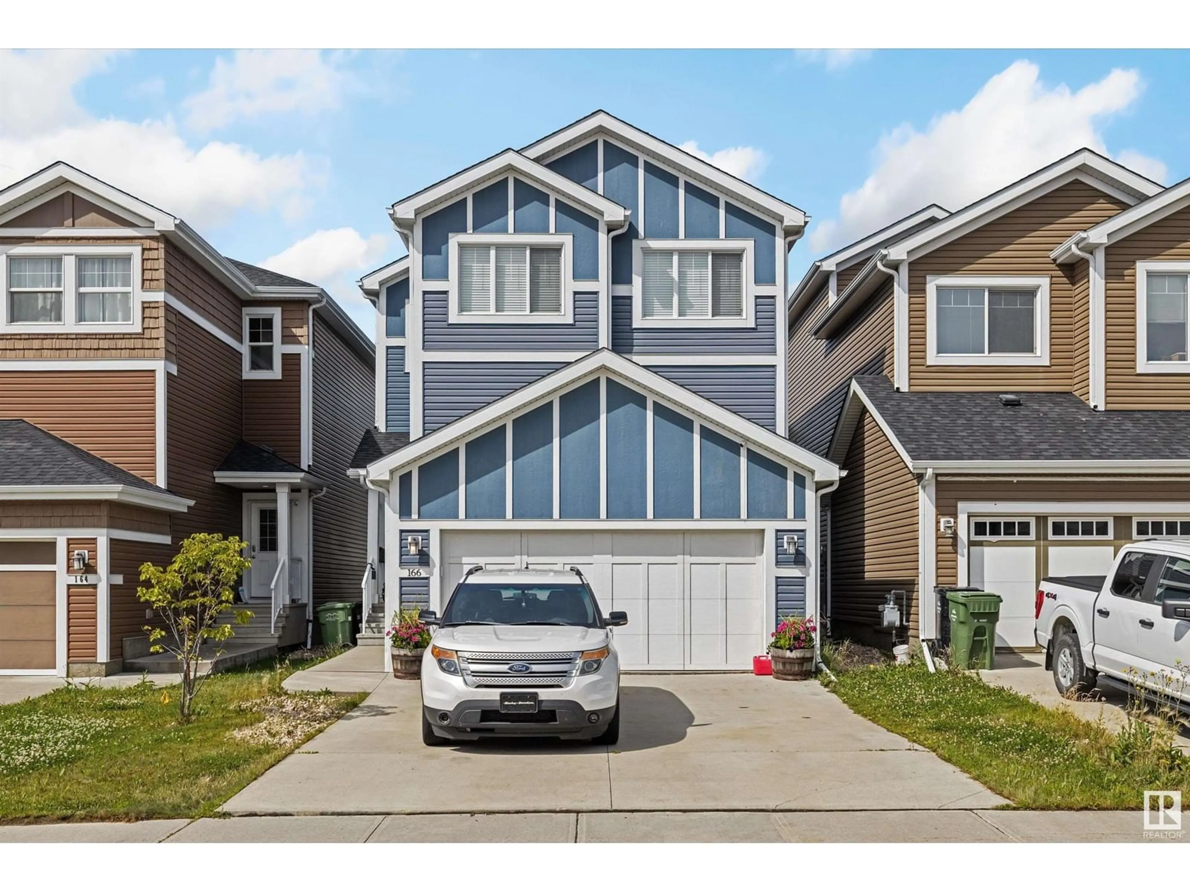 Home with vinyl exterior material, street for 166 STURTZ BN, Leduc Alberta T9E1E3
