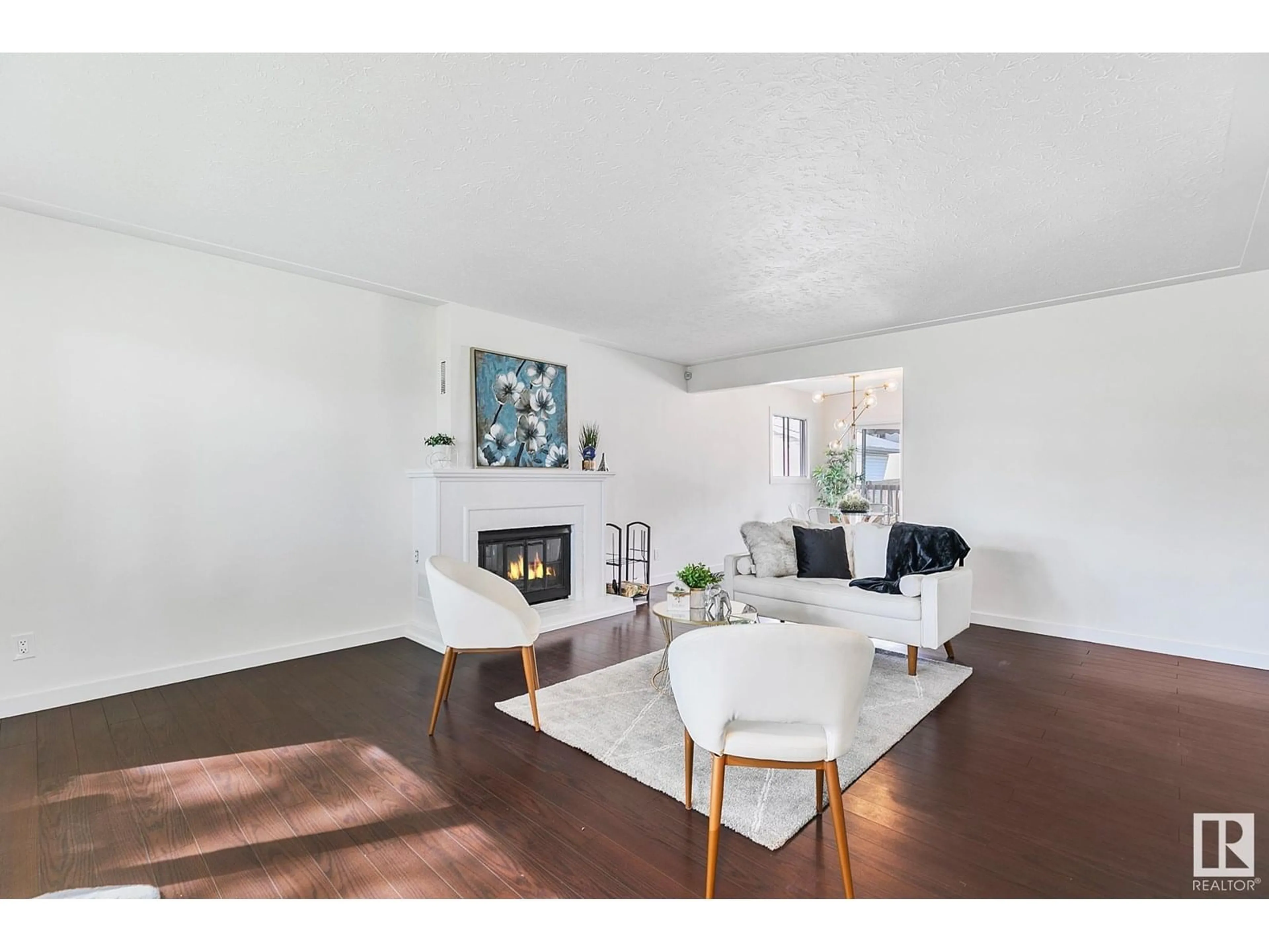 Living room with furniture, unknown for 12216 56 ST, Edmonton Alberta T5W3T4