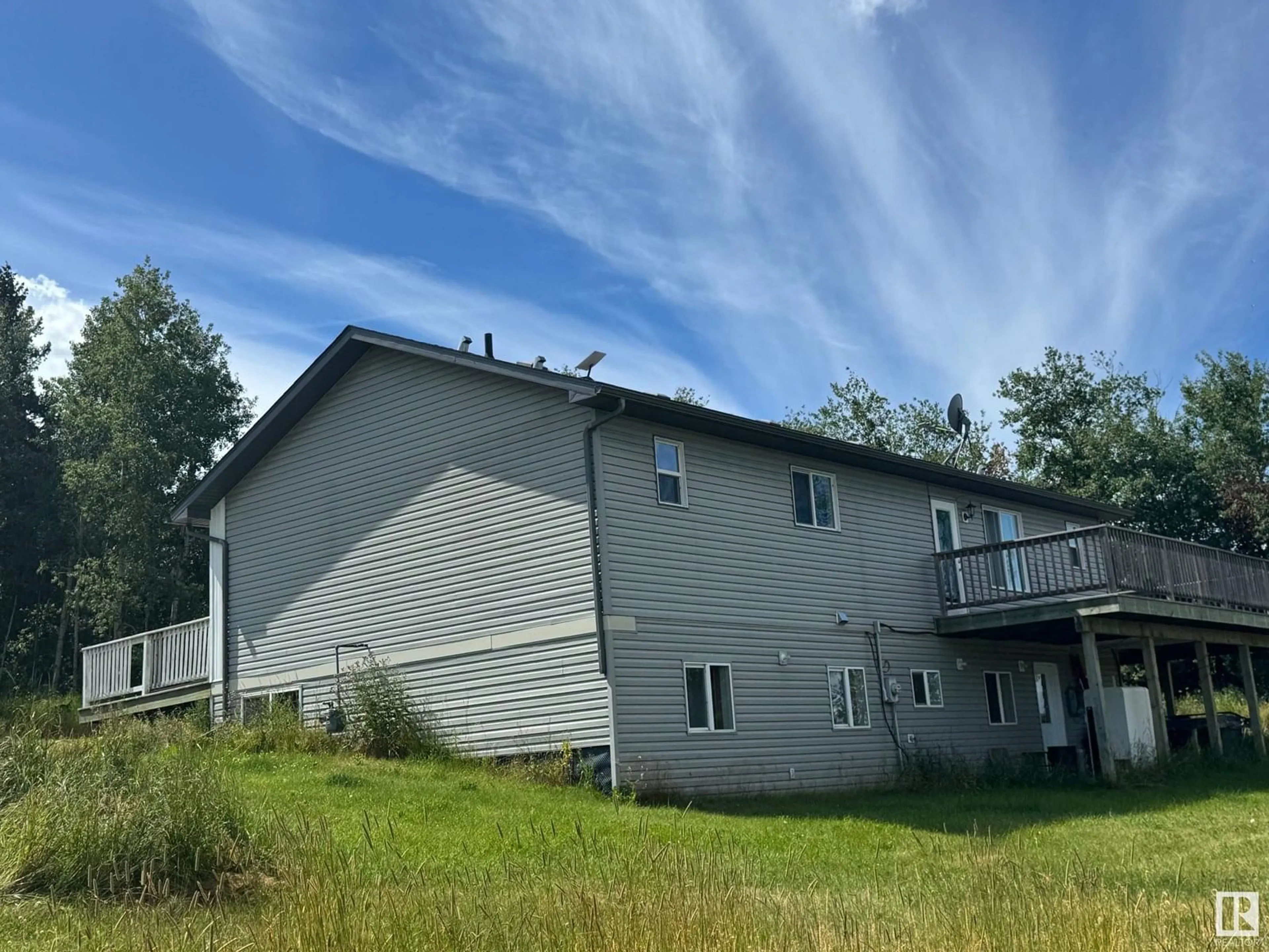 A pic from outside/outdoor area/front of a property/back of a property/a pic from drone, building for 16338 TOWNSHIP ROAD 675, Rural Lac La Biche County Alberta T0A2T0