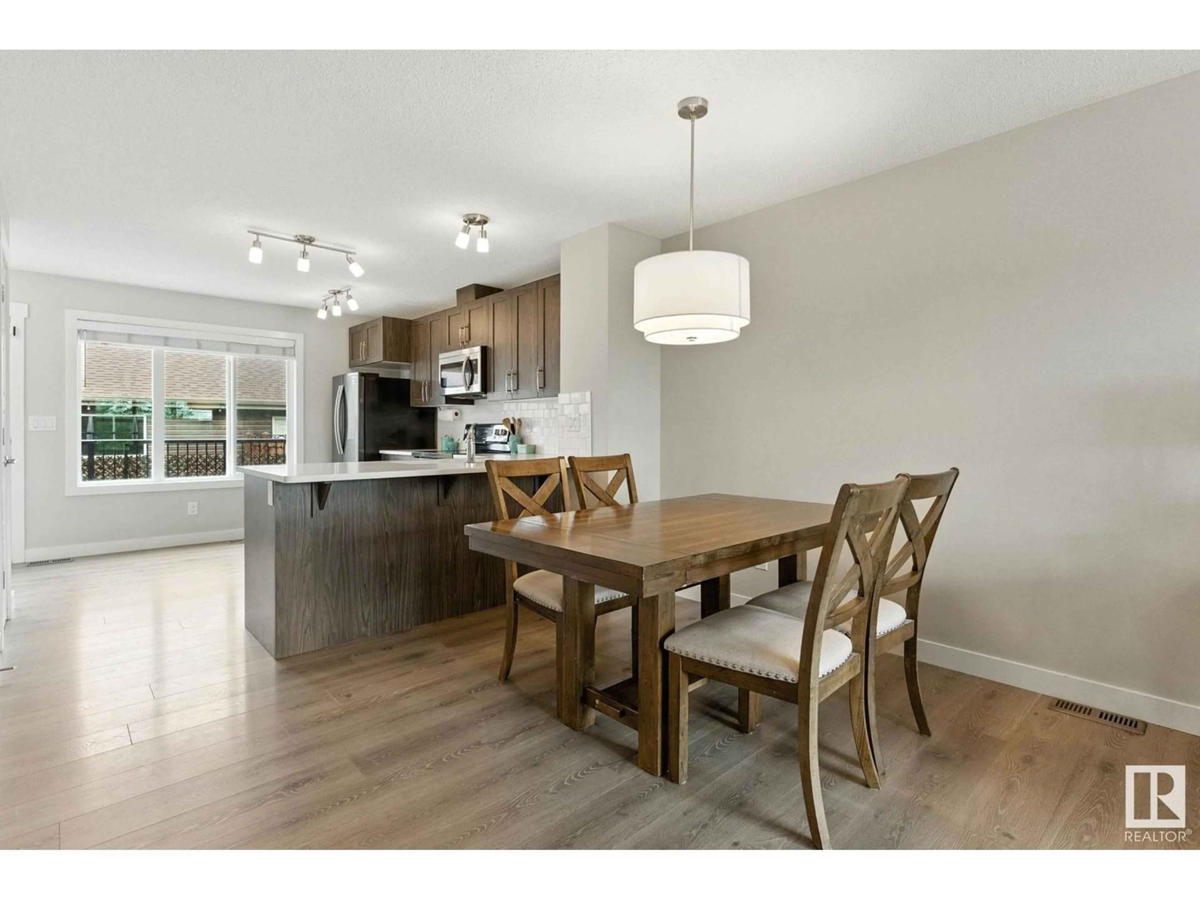 Open concept kitchen, wood/laminate floor for 368 CRYSTALLINA NERA DR, Edmonton Alberta T5Z0R9