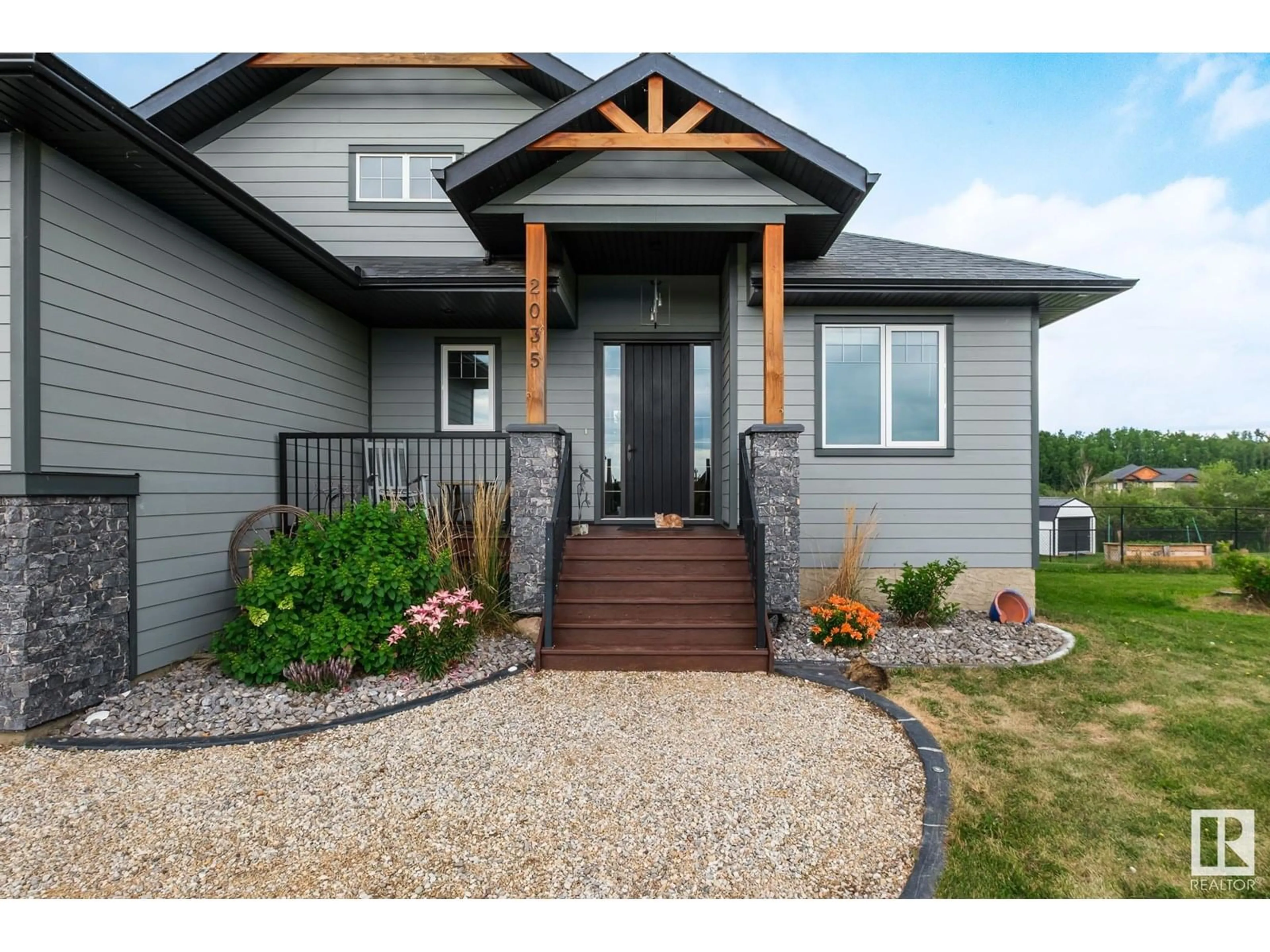 Home with vinyl exterior material, street for 2035 SPRING DR, Rural Parkland County Alberta T7X0G8