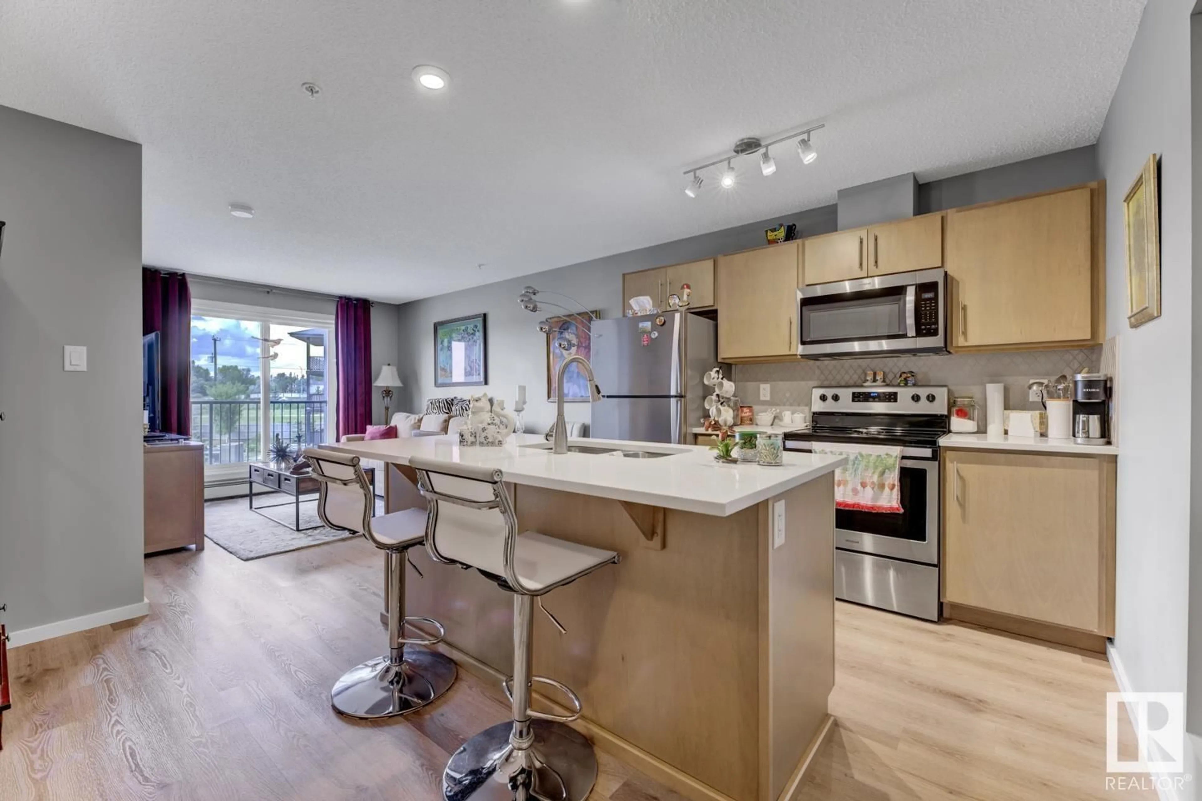 Open concept kitchen, unknown for #327 - 148 EBBERS BV, Edmonton Alberta T5Y4A4