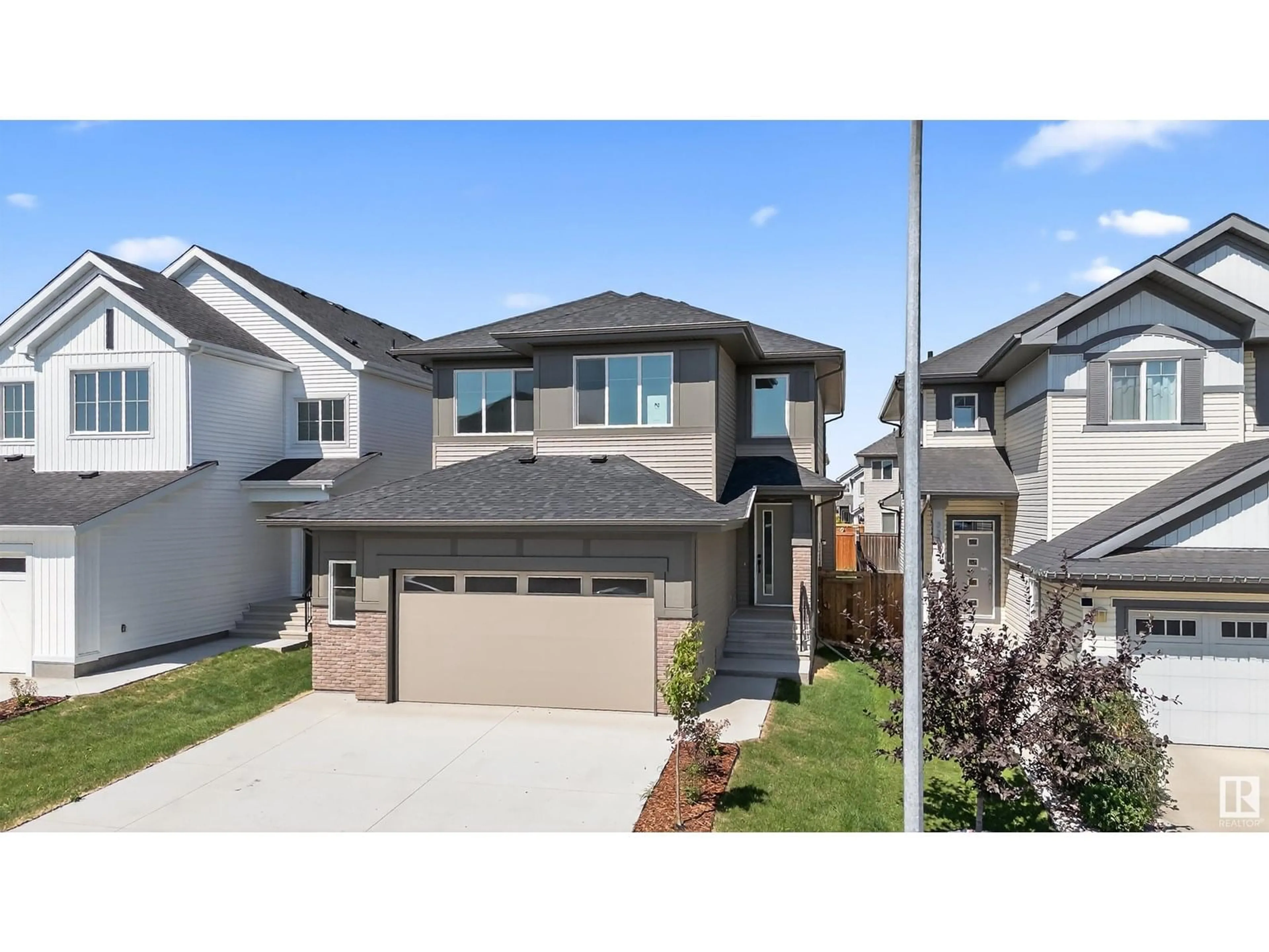 Home with vinyl exterior material, street for 22526 98A AV, Edmonton Alberta T5T7R7