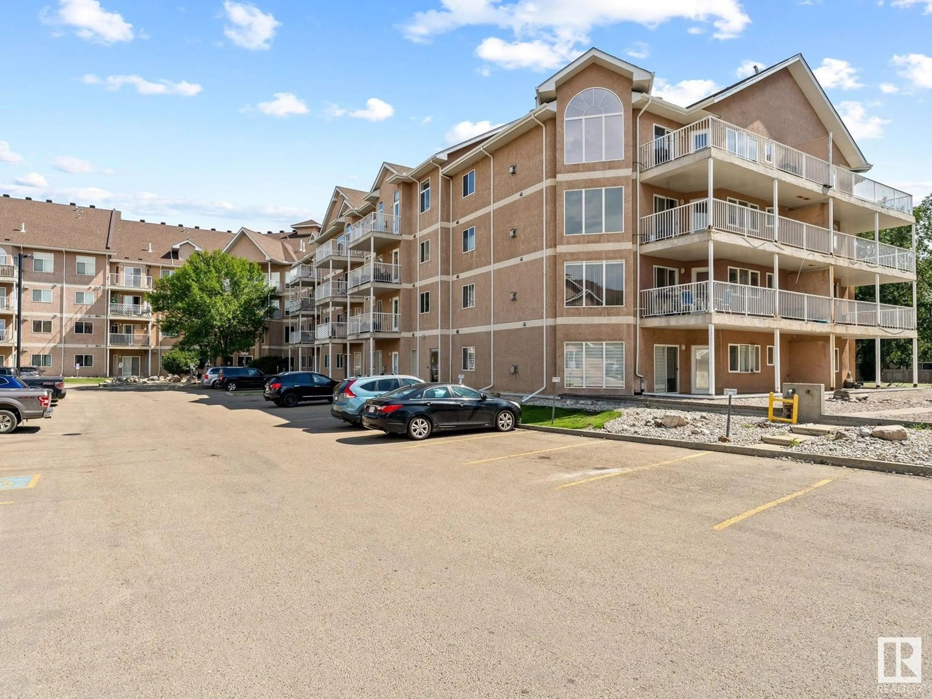 Patio, water/lake/river/ocean view for 426 - 4312 139 AV, Edmonton Alberta T5Y3J4