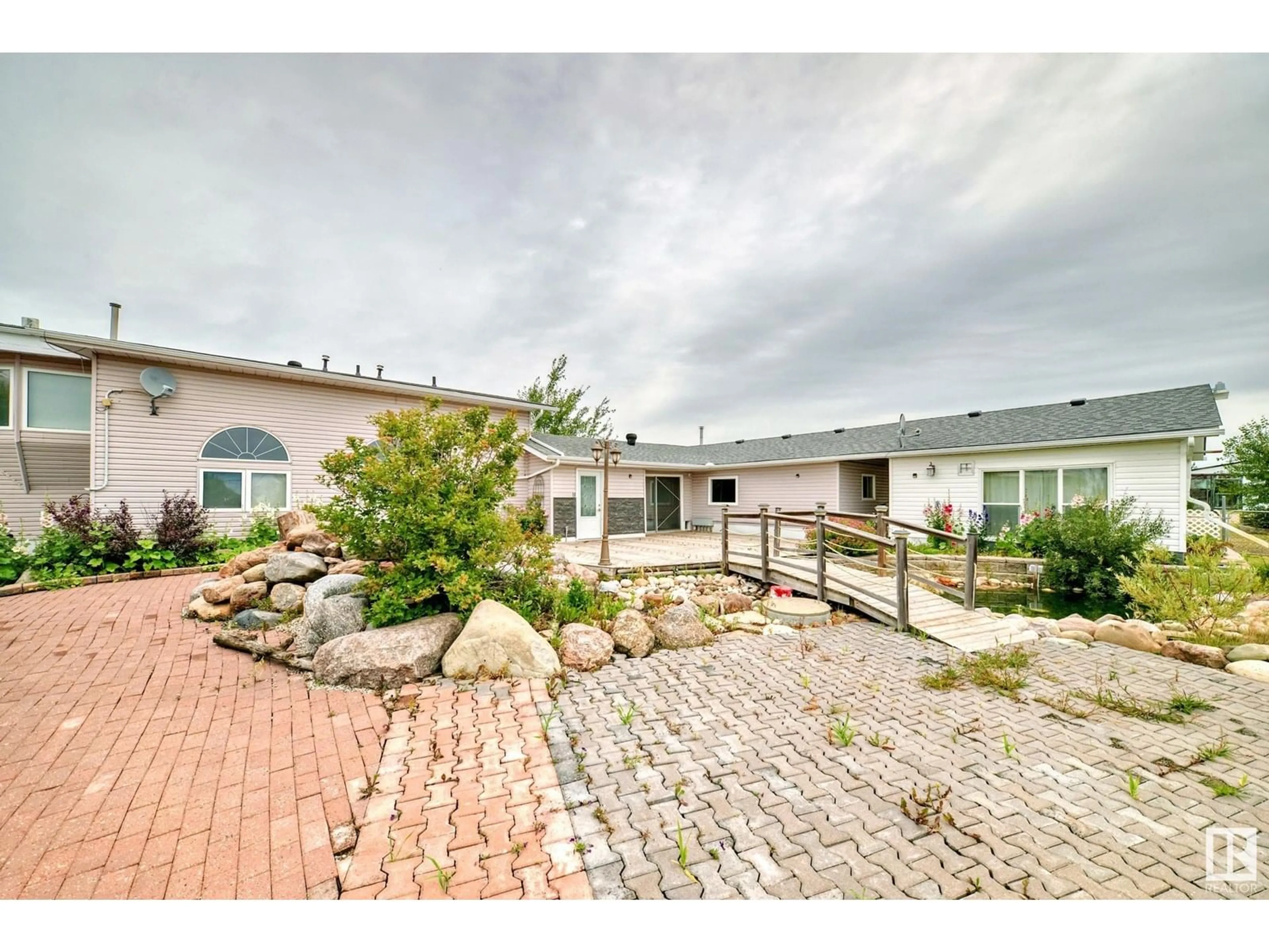 A pic from outside/outdoor area/front of a property/back of a property/a pic from drone, unknown for 25027 TWP ROAD 484, Rural Leduc County Alberta T4X2T7