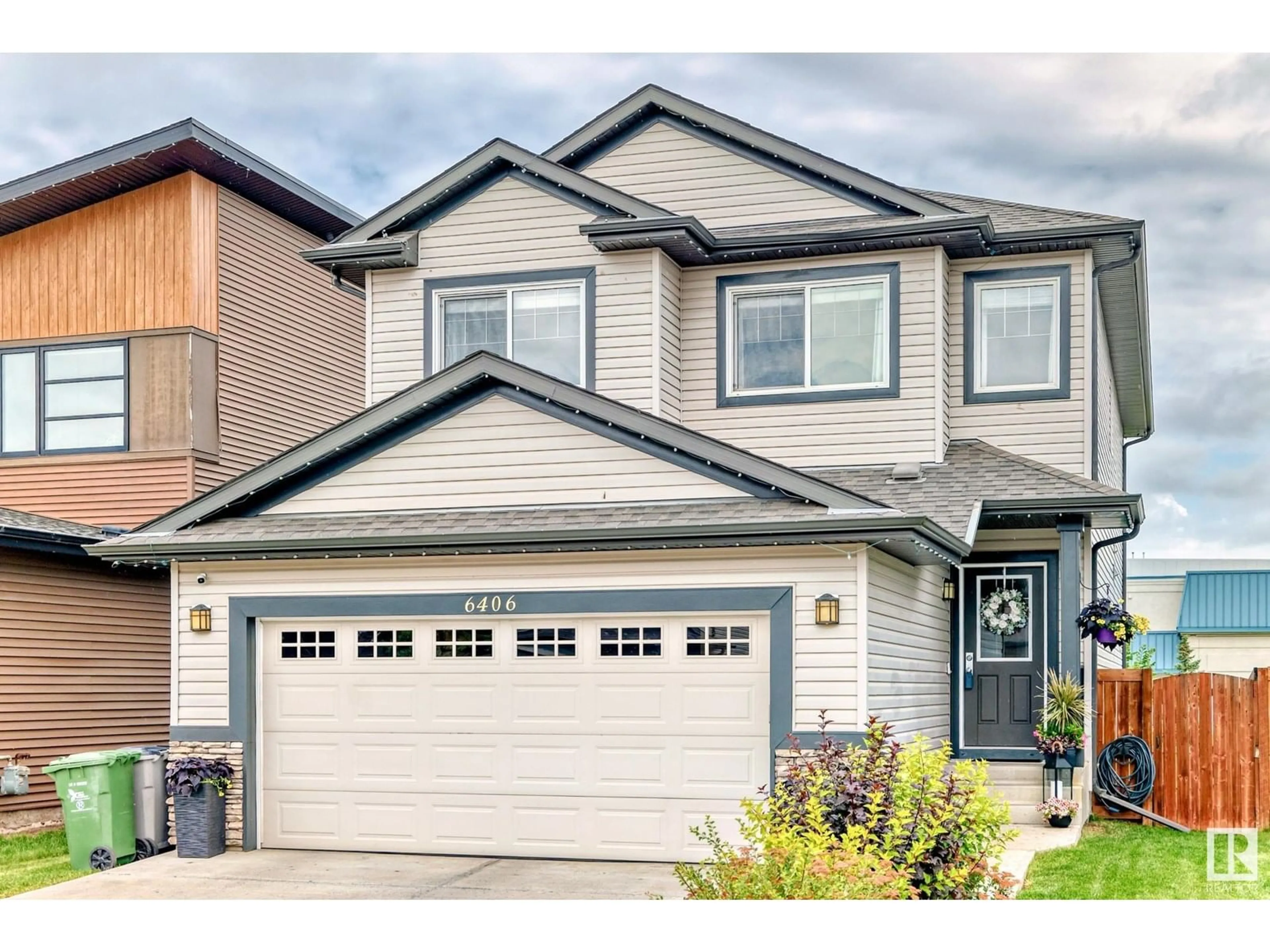 Home with vinyl exterior material, street for 6406 49 AV, Beaumont Alberta T4X0W5