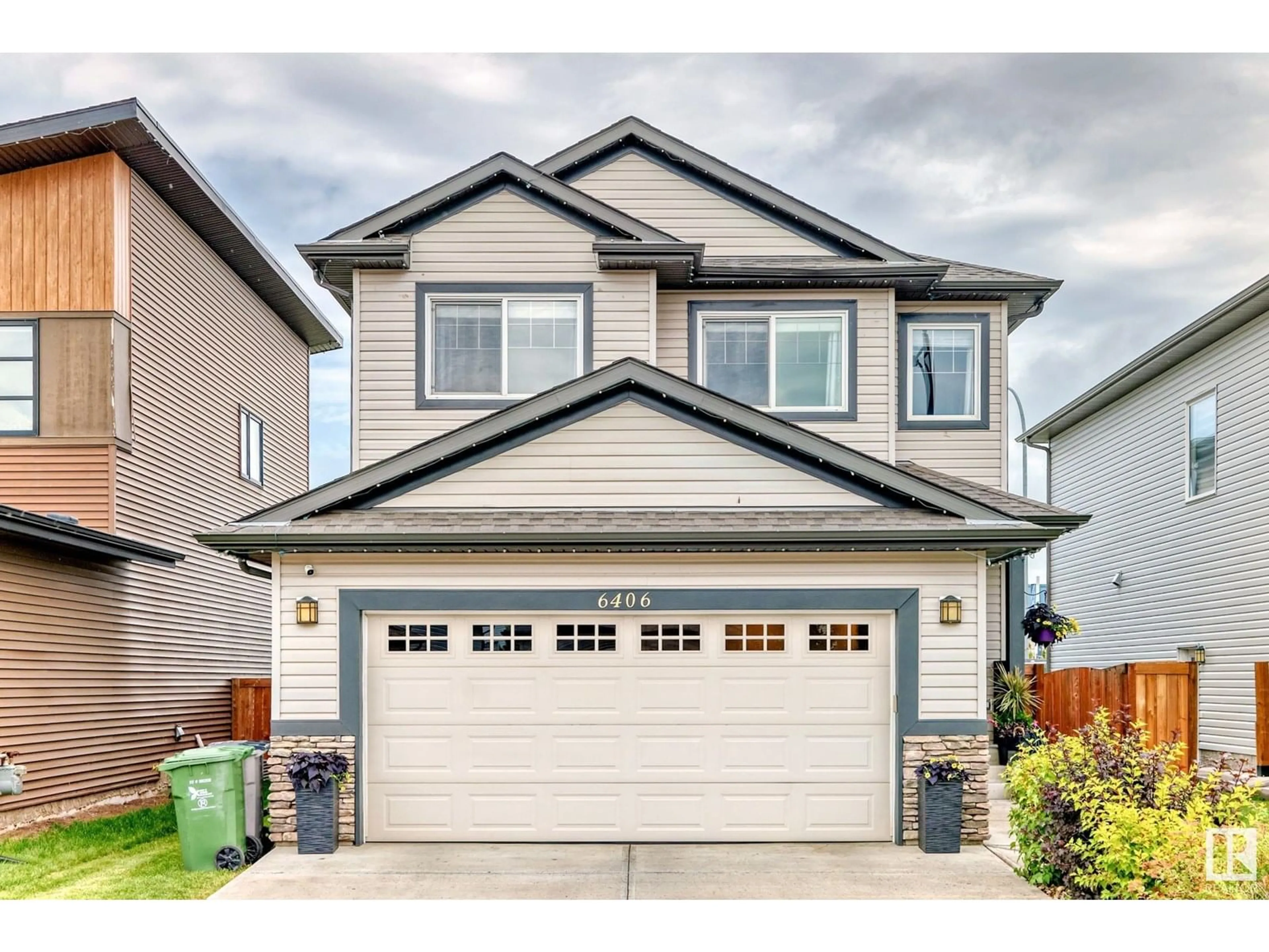 Home with vinyl exterior material, street for 6406 49 AV, Beaumont Alberta T4X0W5