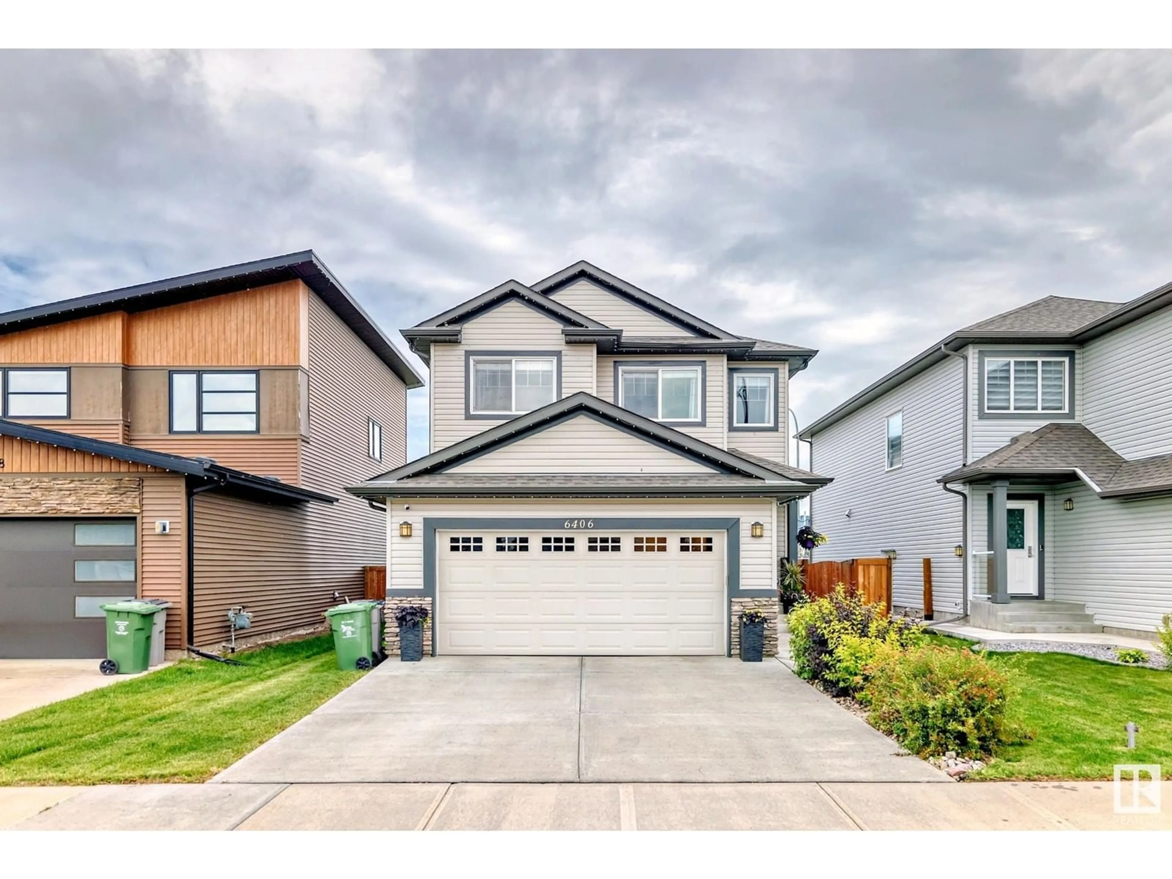 Home with vinyl exterior material, street for 6406 49 AV, Beaumont Alberta T4X0W5