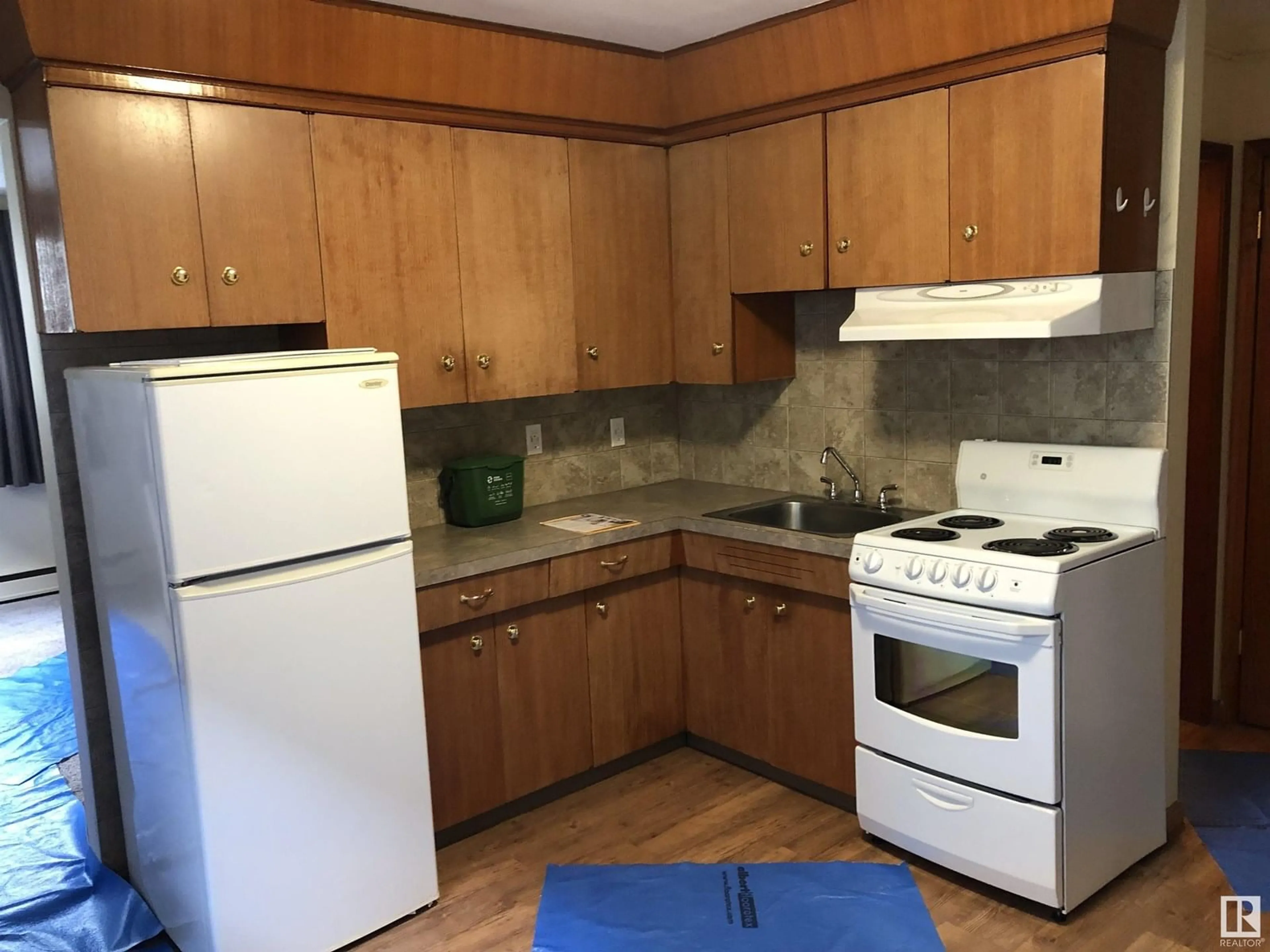 Standard kitchen, wood/laminate floor for 10742 106 ST, Edmonton Alberta T5H2X9