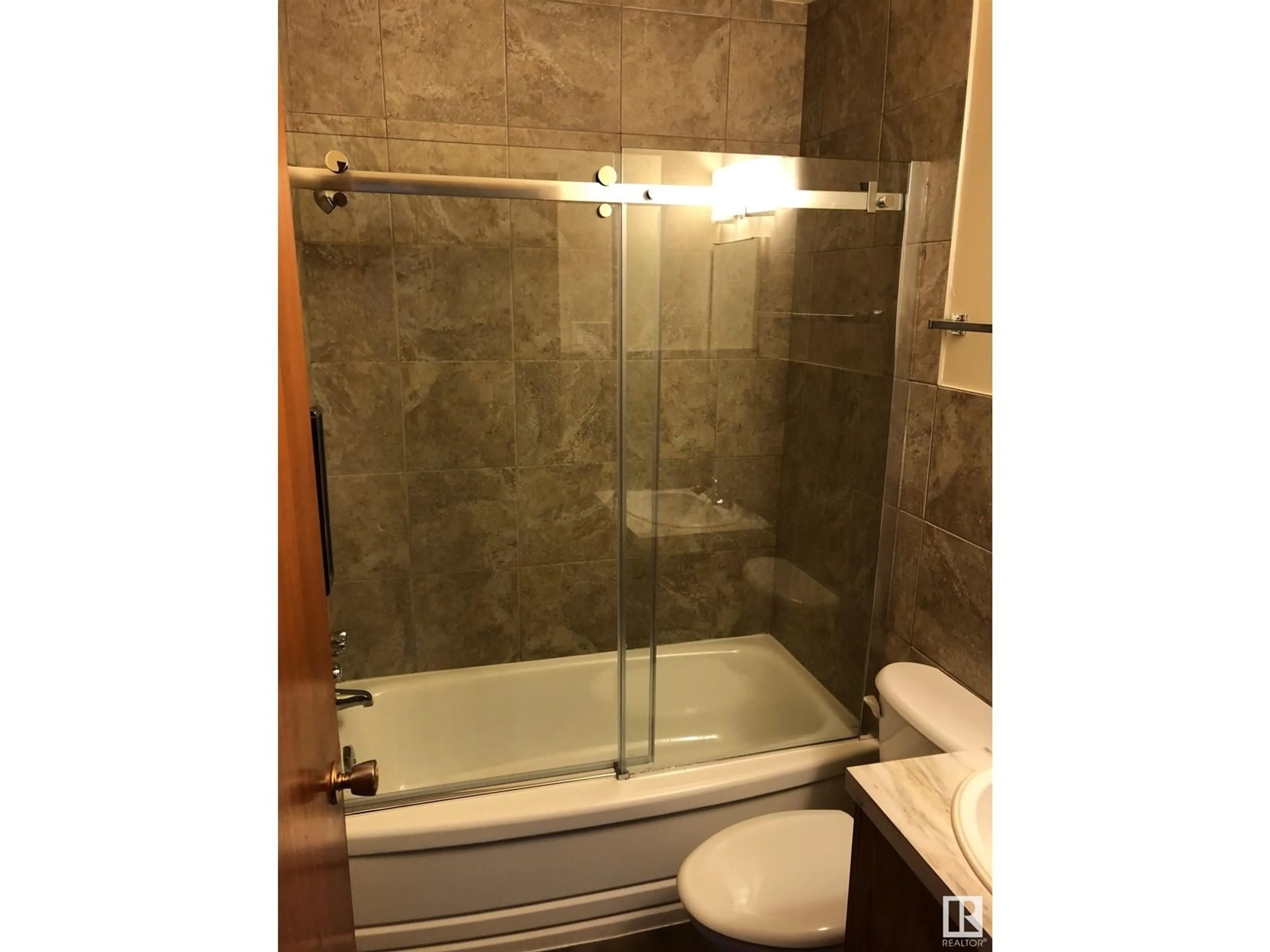 Standard bathroom, ceramic/tile floor for 10742 106 ST, Edmonton Alberta T5H2X9