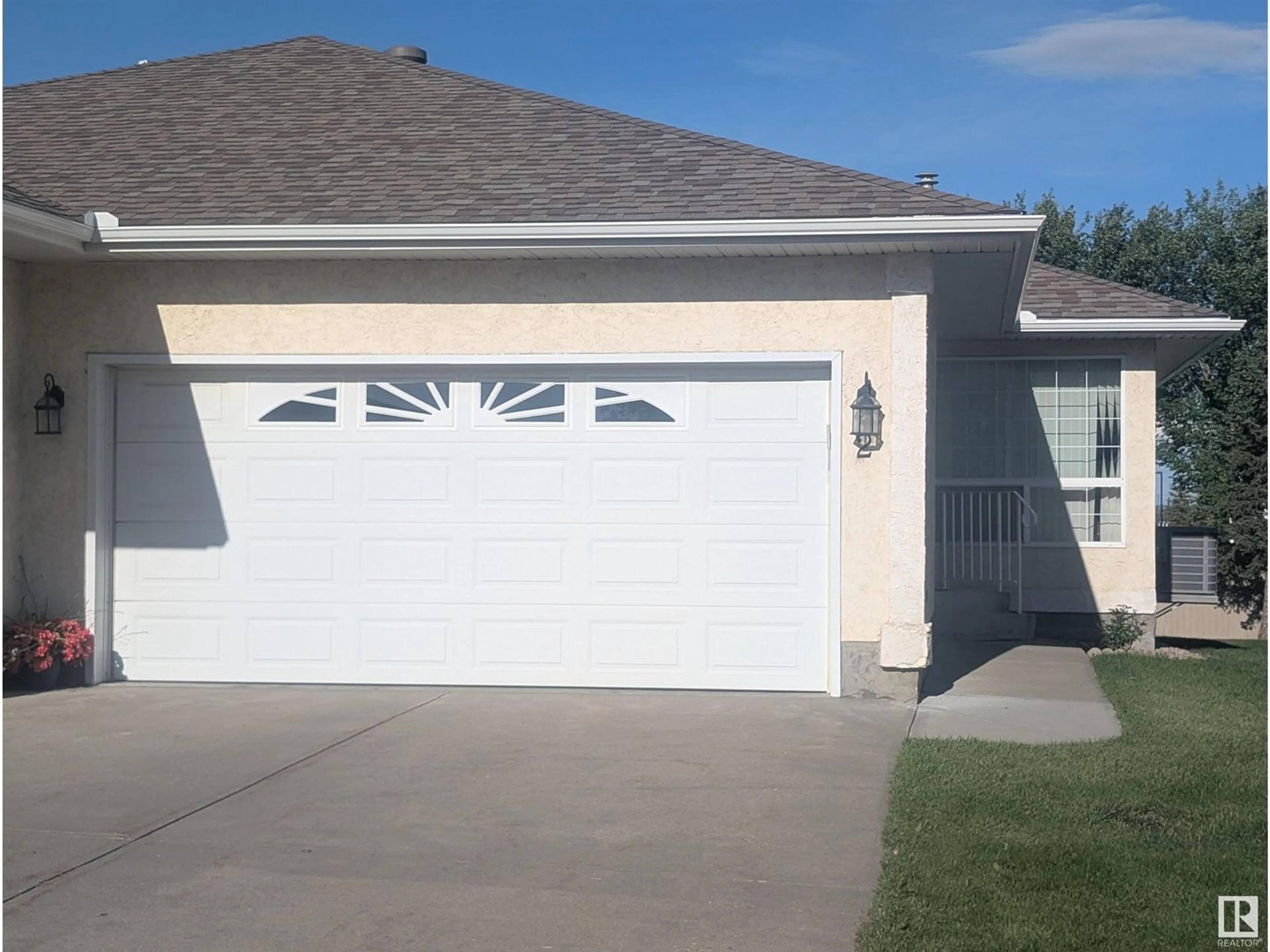 Home with vinyl exterior material, street for #2 - 14428 MILLER BLVD, Edmonton Alberta T5Y2Y6