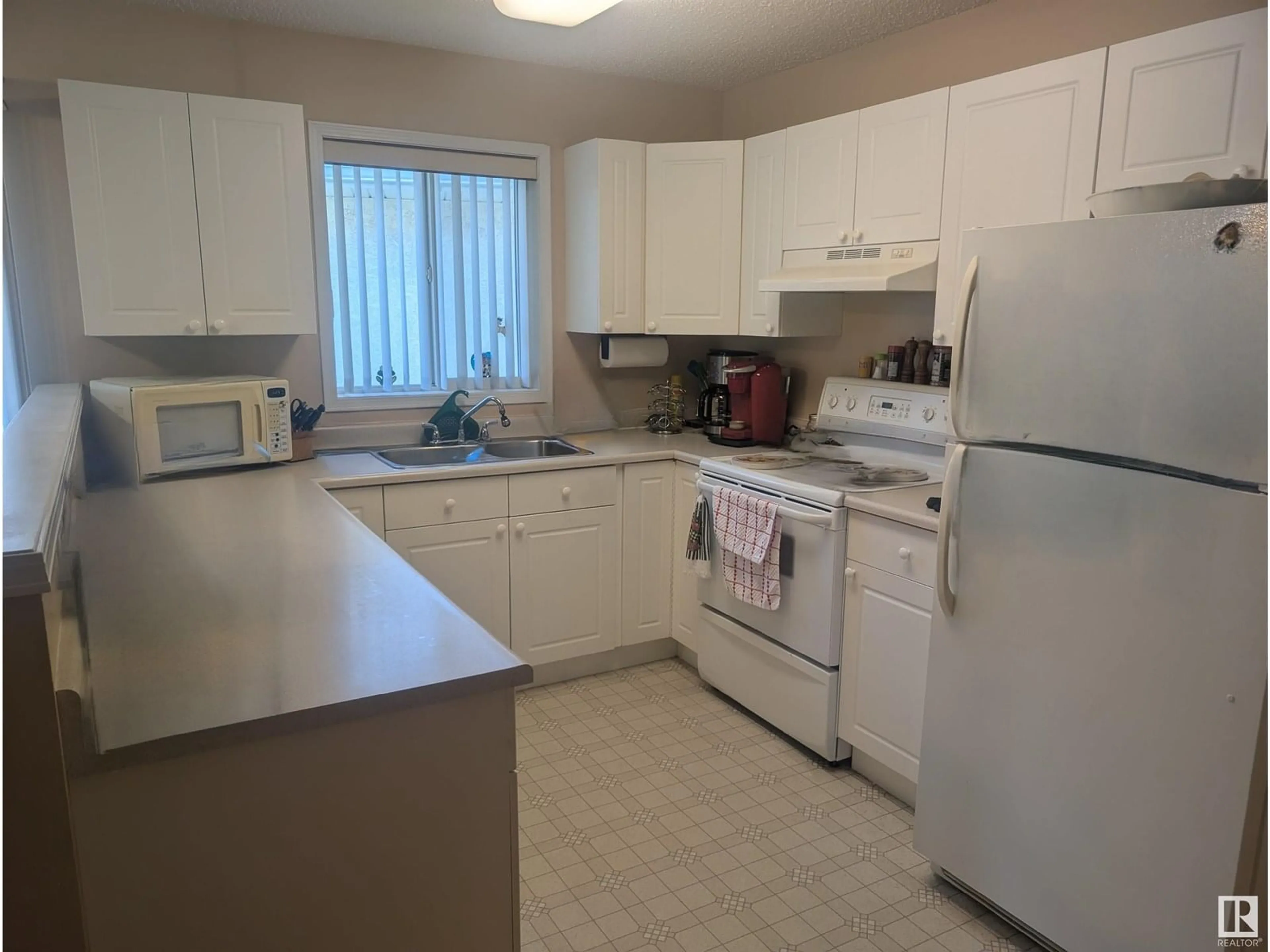 Standard kitchen, unknown for #2 - 14428 MILLER BLVD, Edmonton Alberta T5Y2Y6