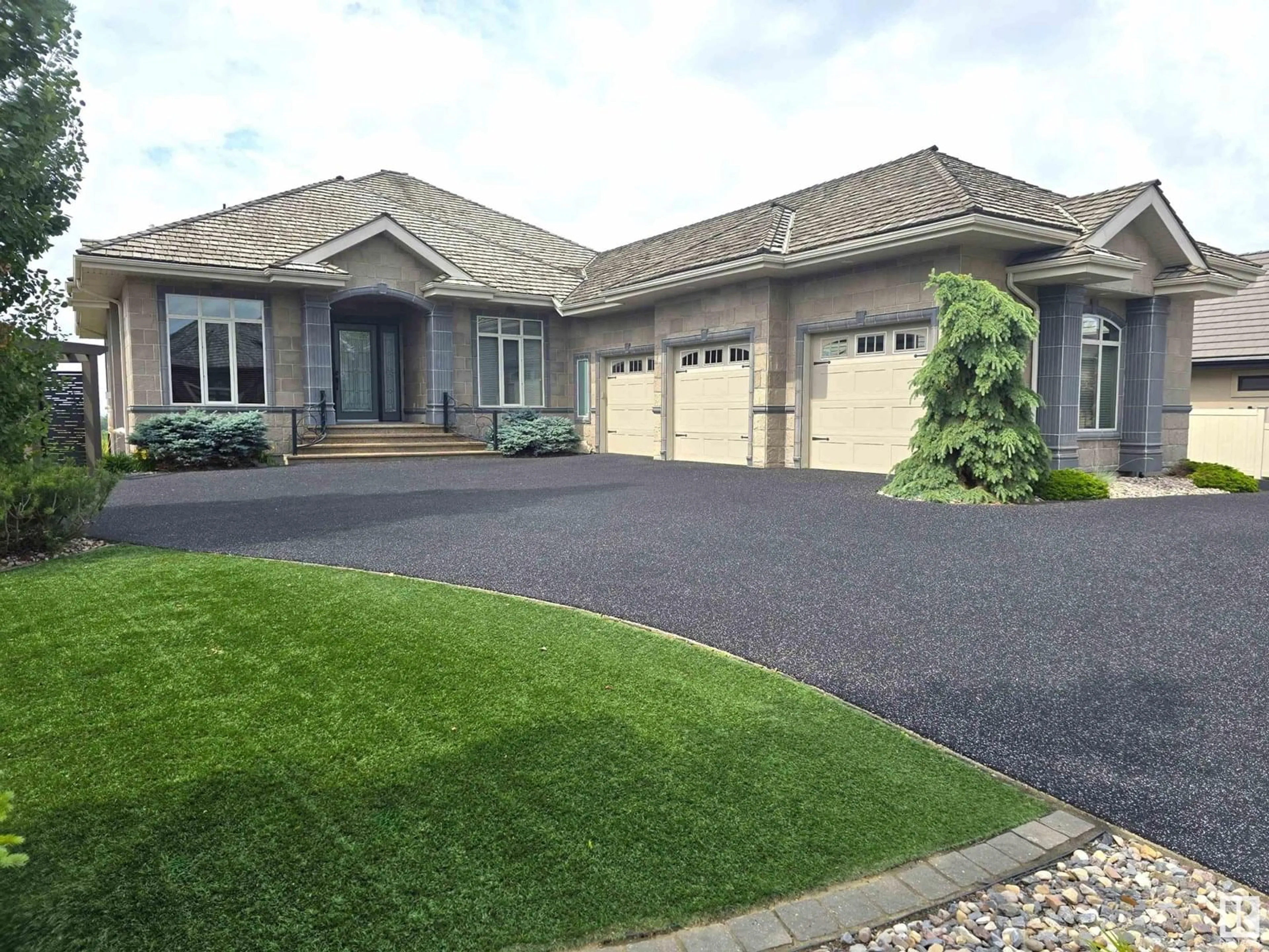 Home with vinyl exterior material, street for 52328 - 491 RGE ROAD 233, Rural Strathcona County Alberta T8B0A2