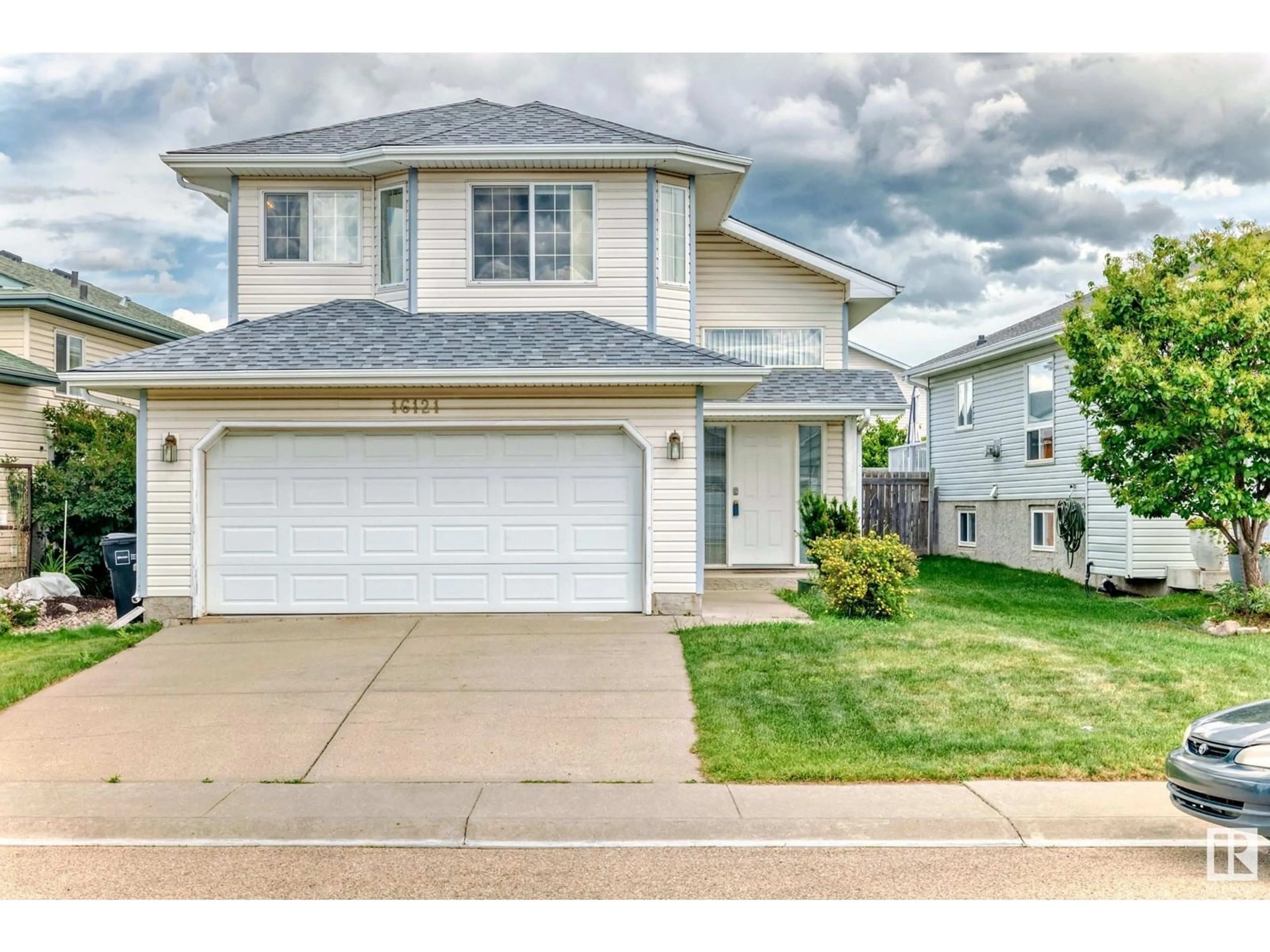 Home with vinyl exterior material, street for NW - 16121 128A ST, Edmonton Alberta T6V1P2