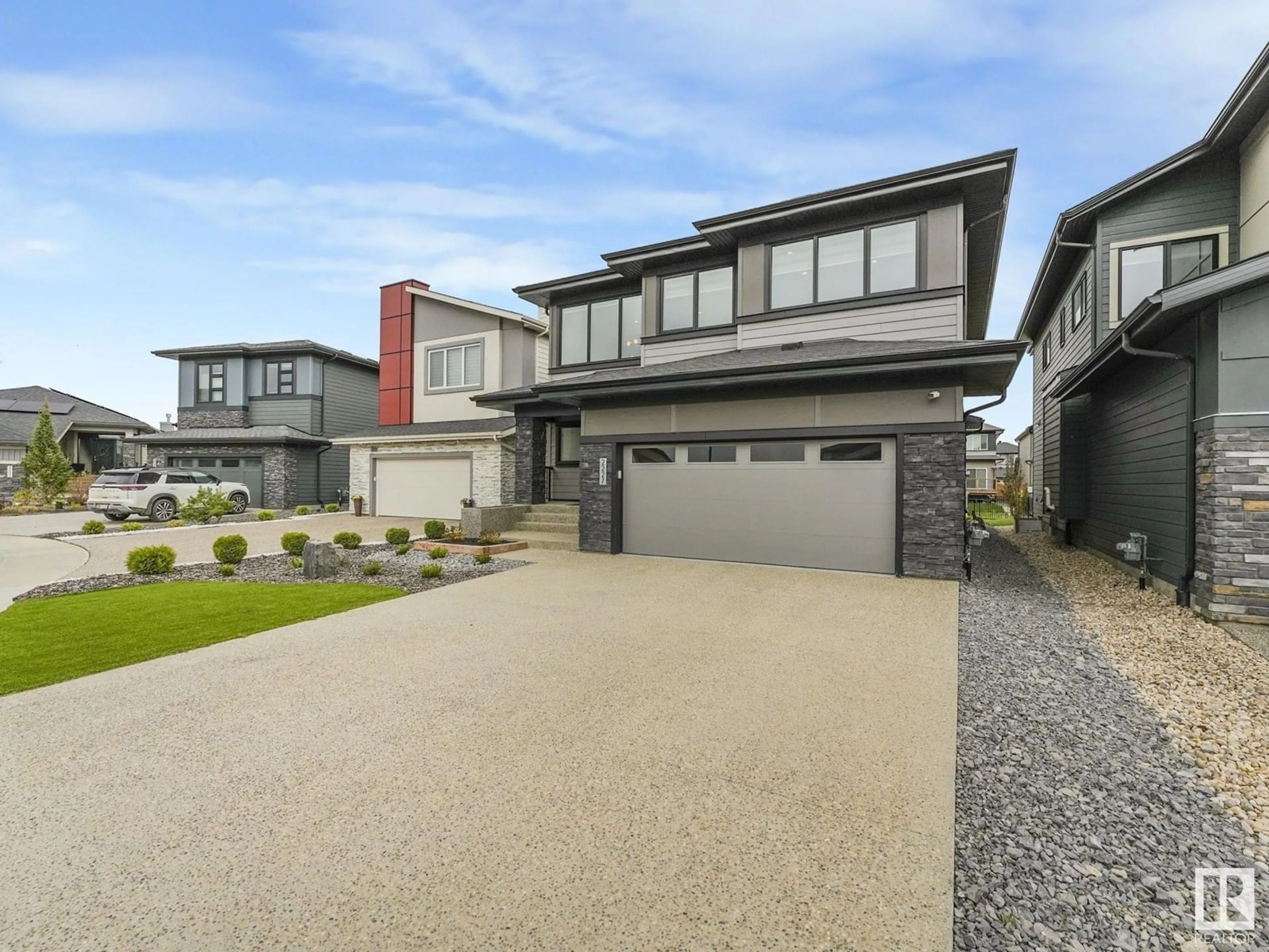 Home with vinyl exterior material, street for 2227 KELLY CR, Edmonton Alberta T6W3R8