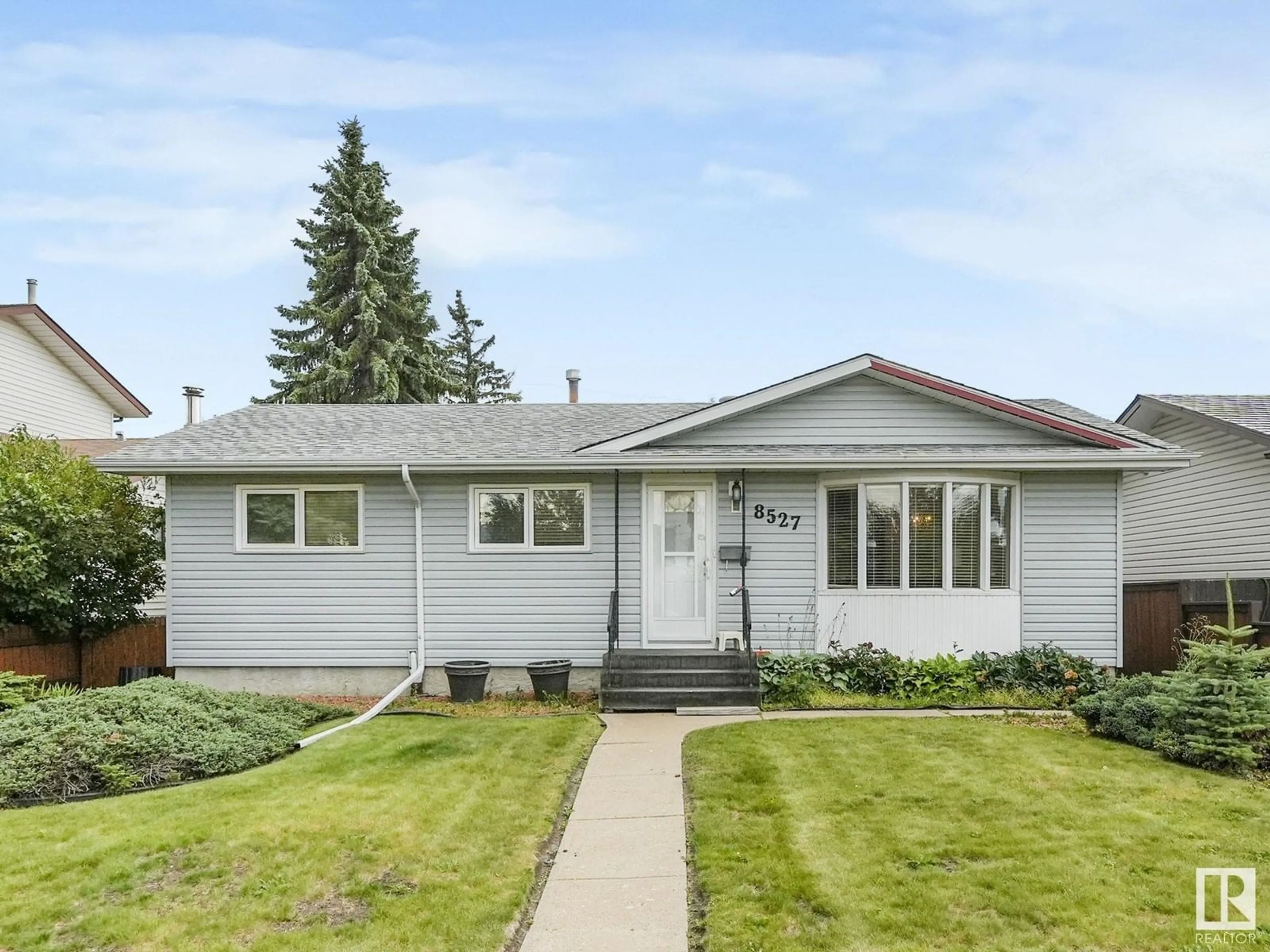 Home with vinyl exterior material, street for NW - 8527 134A AV, Edmonton Alberta T5E1L6