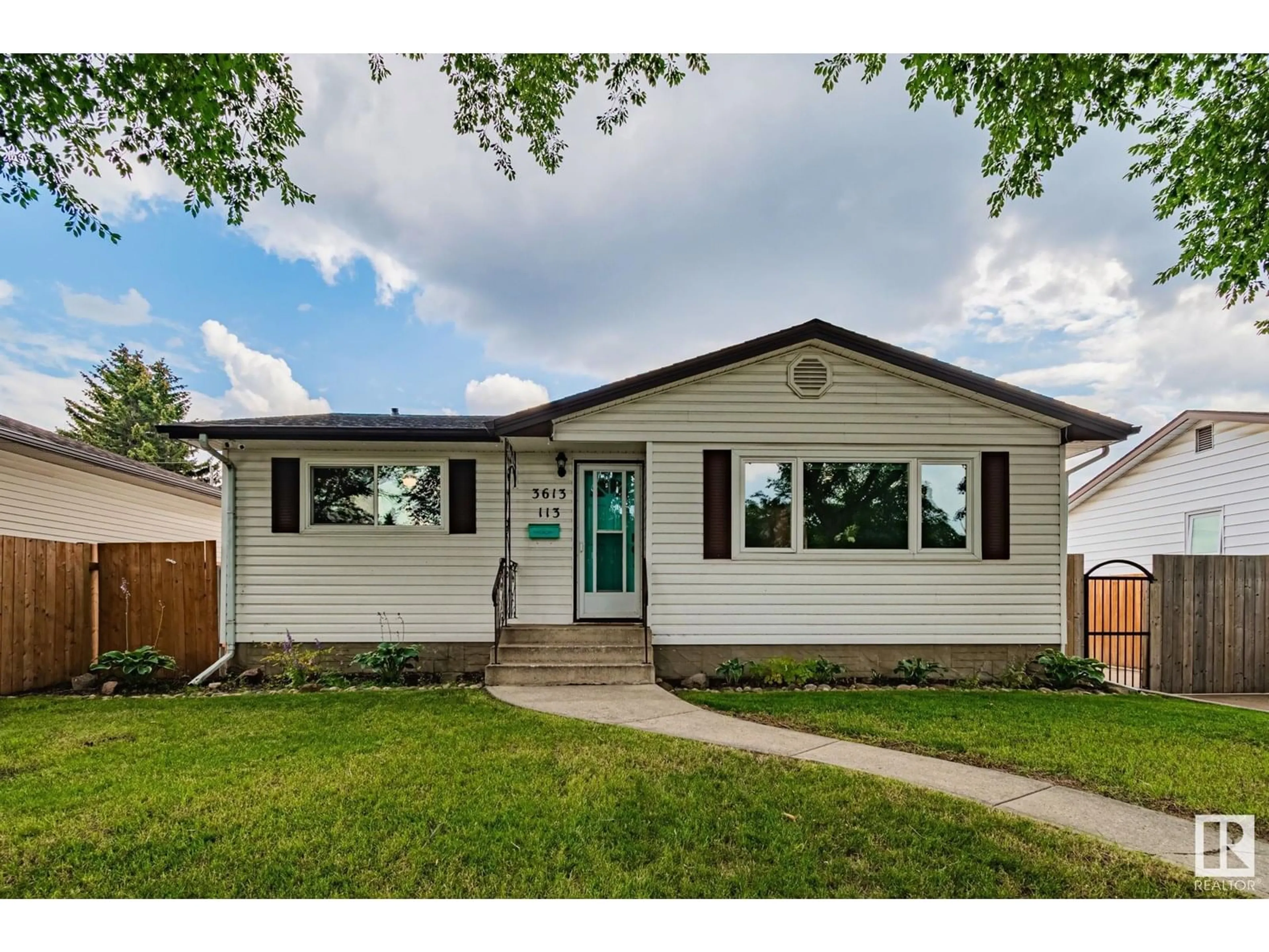 Home with vinyl exterior material, street for 3613 113 AV, Edmonton Alberta T5W0P7