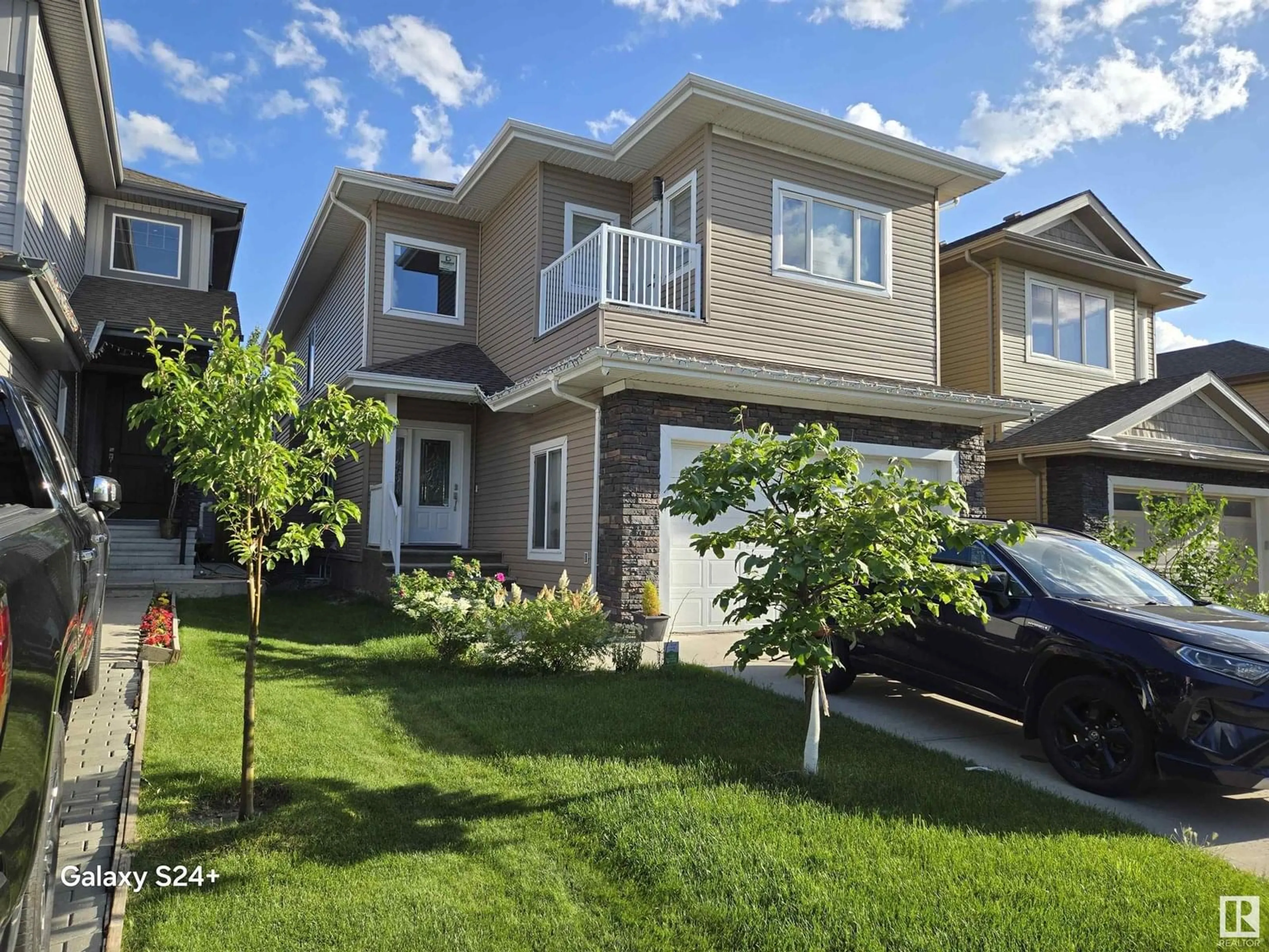 Home with vinyl exterior material, street for SW - 5121 1B AV, Edmonton Alberta T6X0Z7