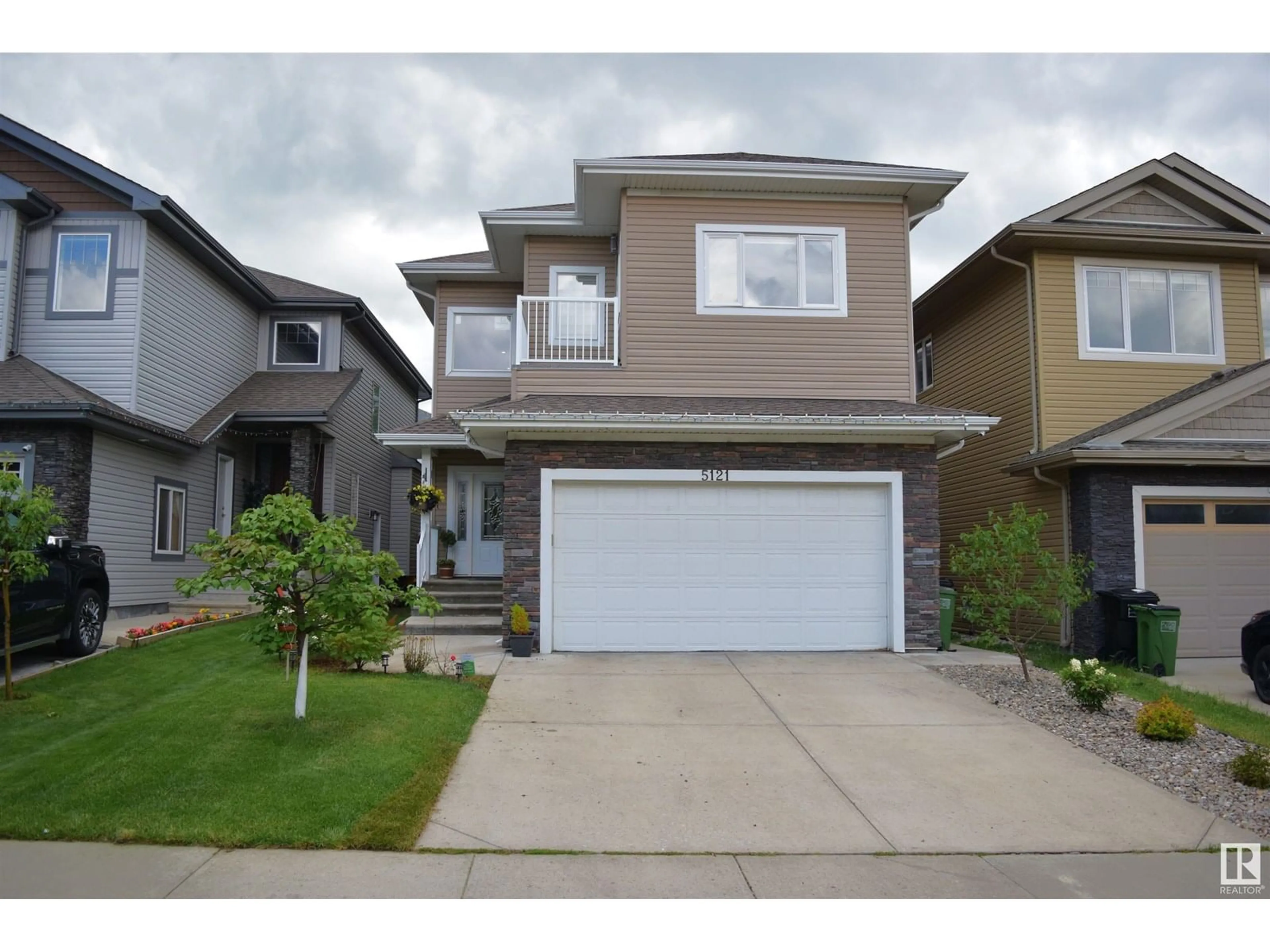 Home with vinyl exterior material, street for SW - 5121 1B AV, Edmonton Alberta T6X0Z7