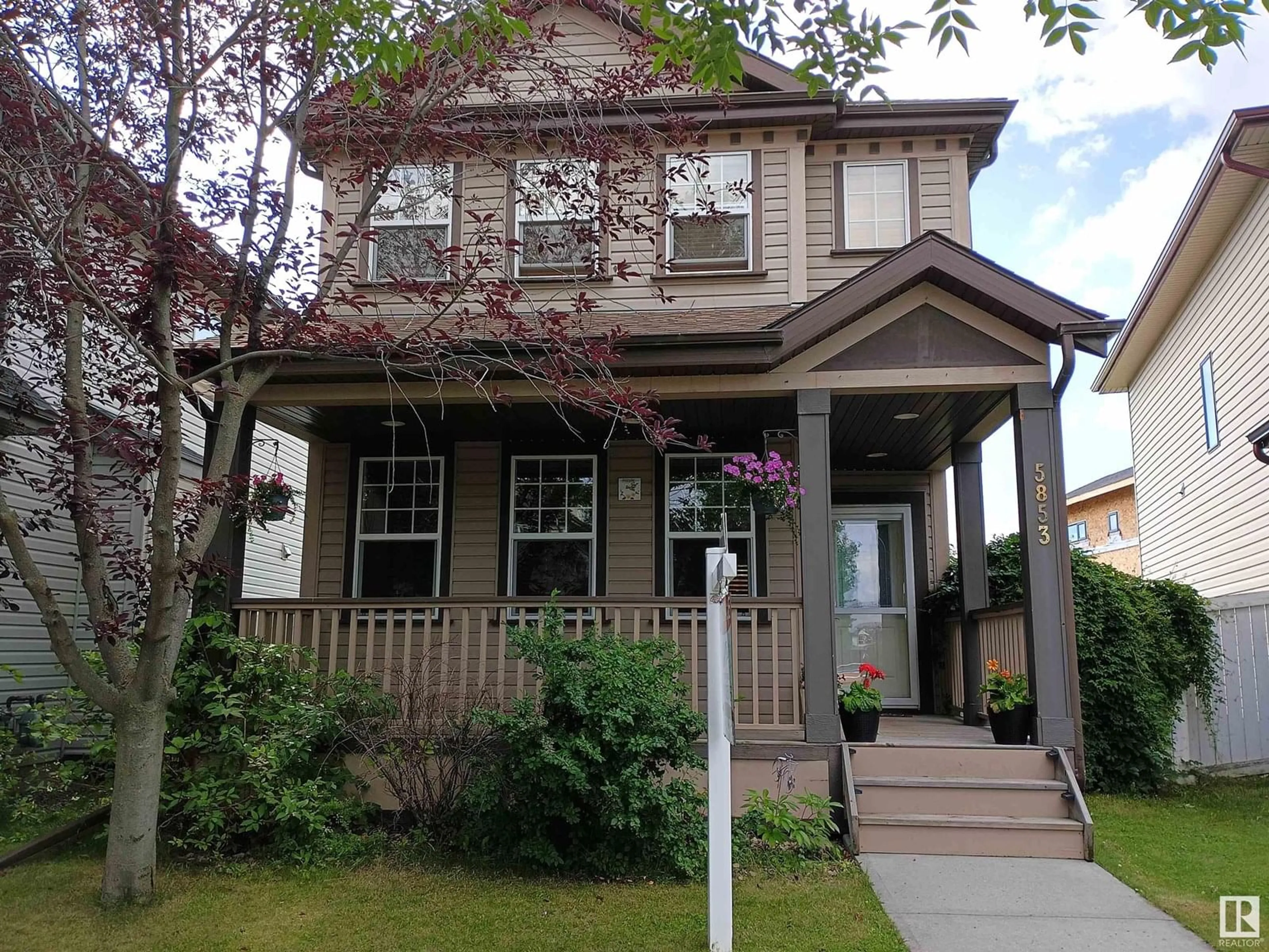 Home with vinyl exterior material, street for 5853 SUTTER PL, Edmonton Alberta T6R3R2