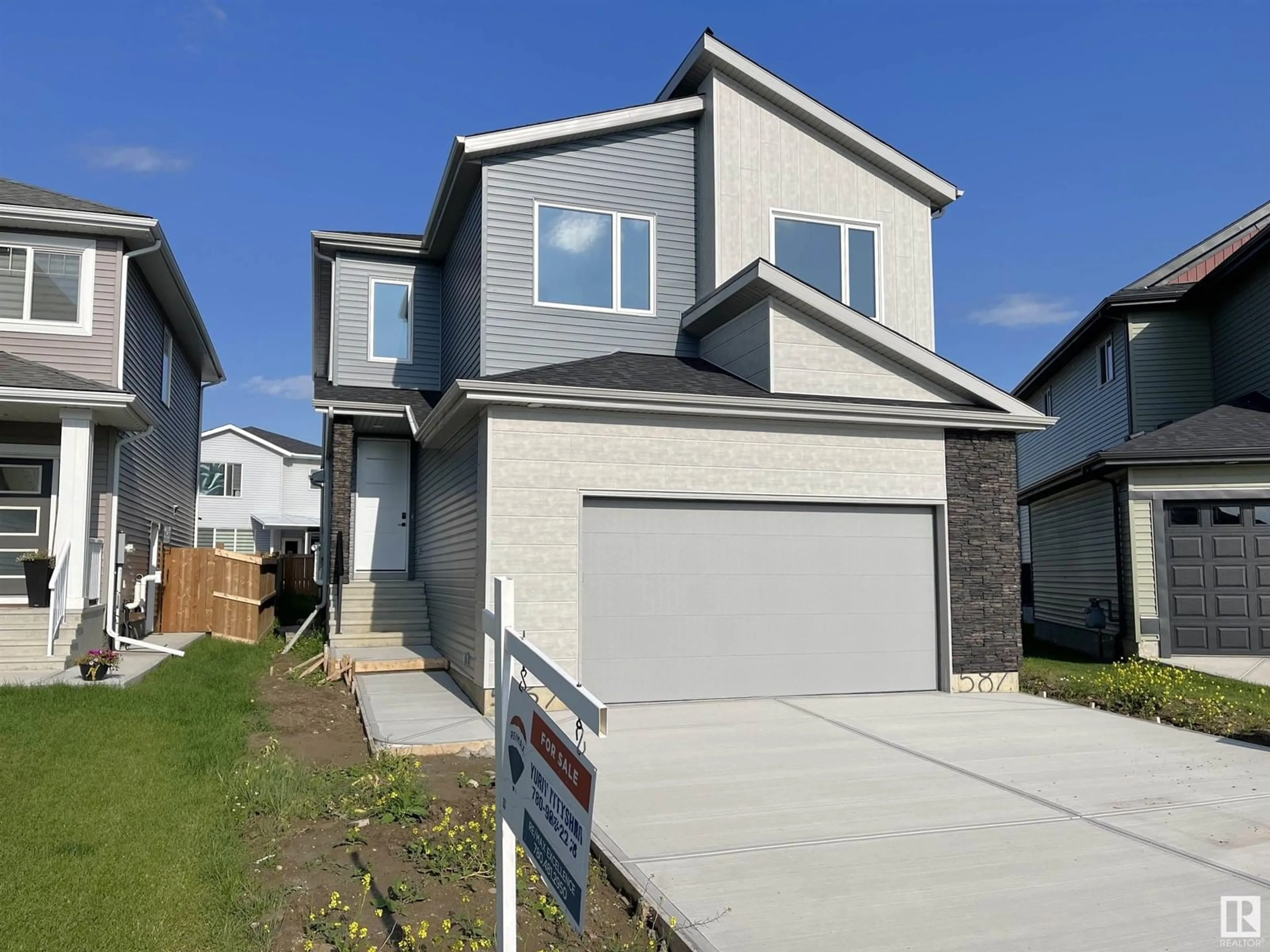 Home with vinyl exterior material, street for 587 BOULDER WD, Leduc Alberta T9E1M1