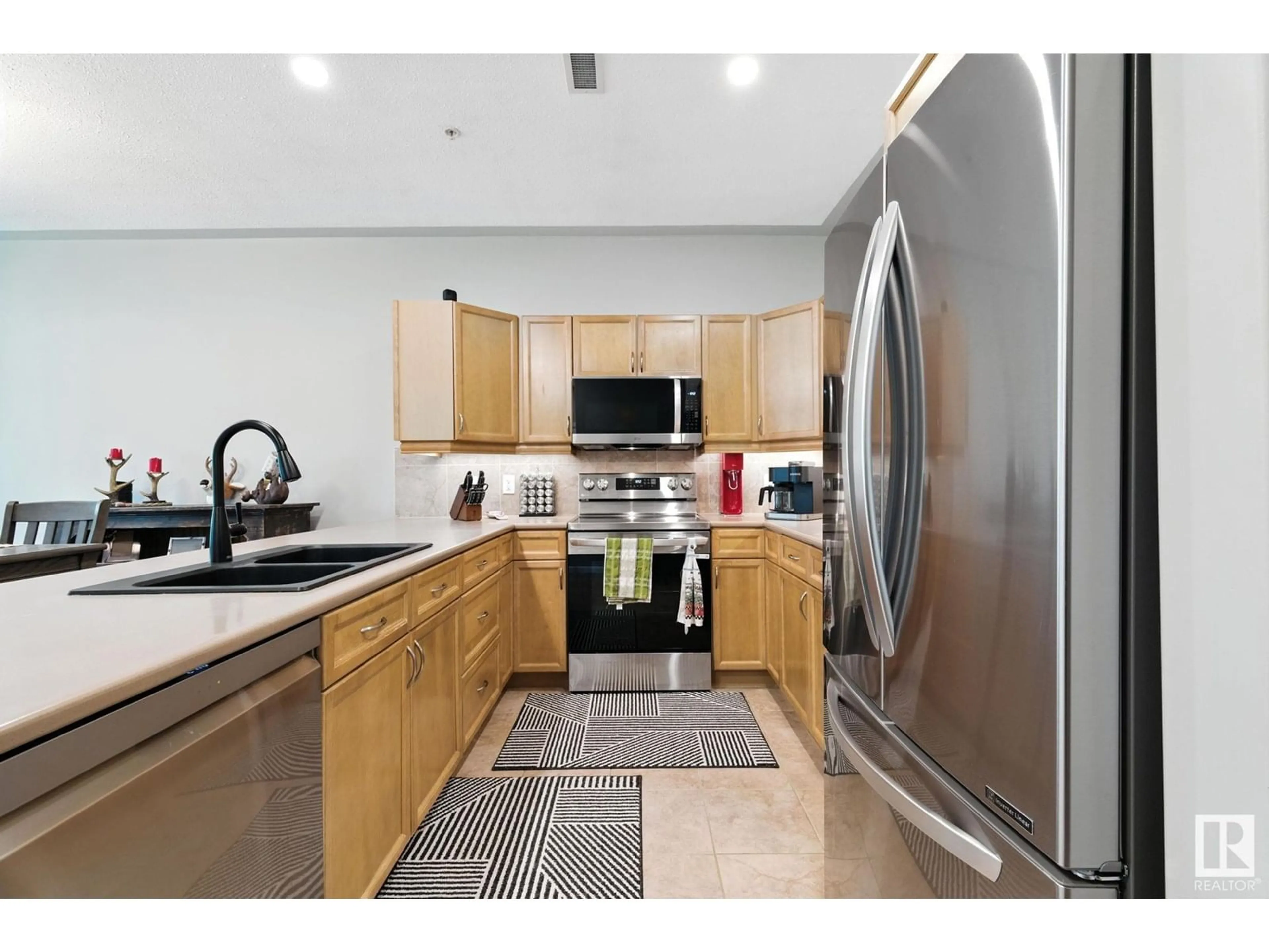 Standard kitchen, ceramic/tile floor for 160 - 137 MAGRATH RD, Edmonton Alberta T6R3T7