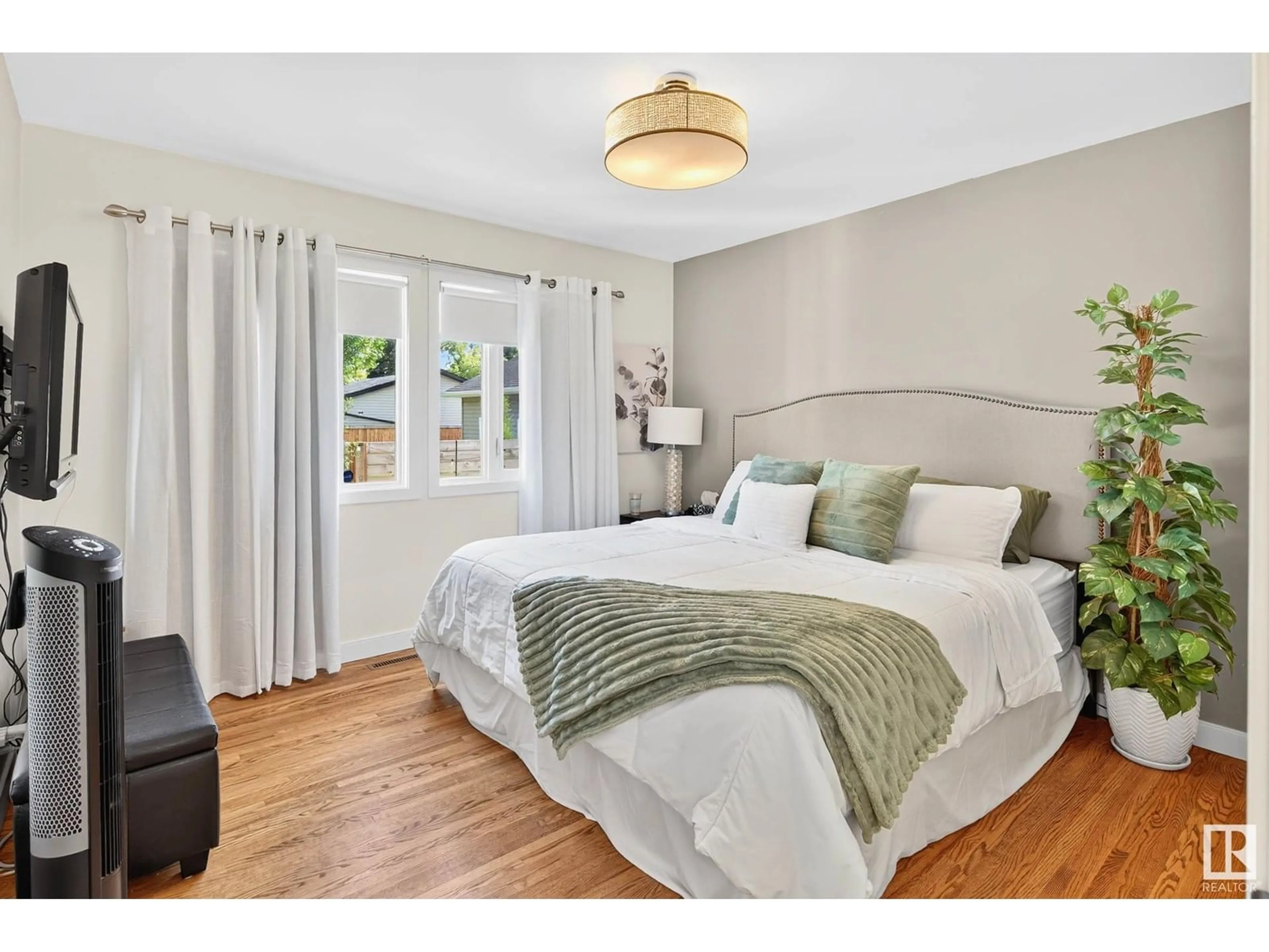 Bedroom with bed, wood/laminate floor for 8920 146 ST, Edmonton Alberta T5R0V8
