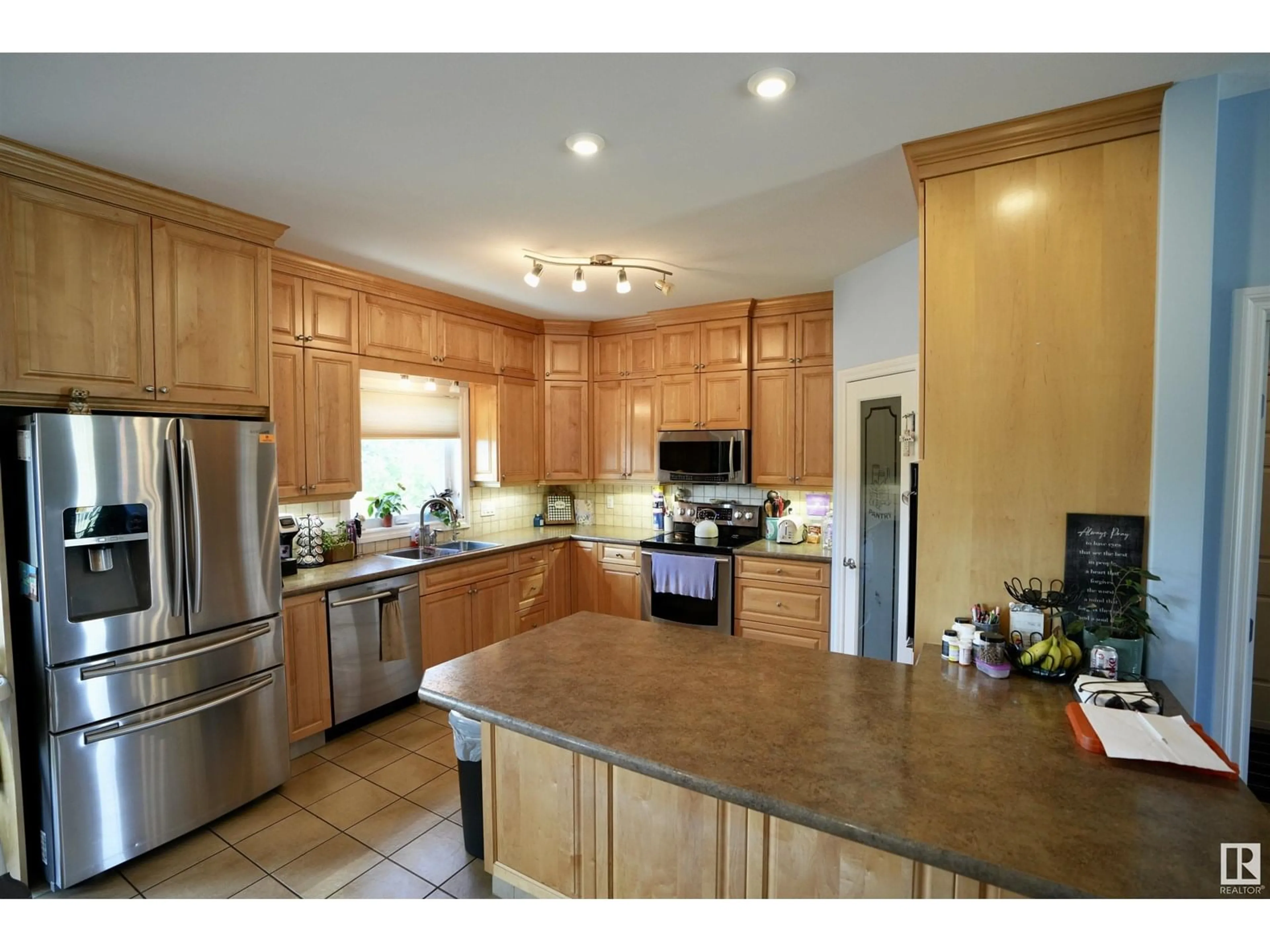 Open concept kitchen, ceramic/tile floor for 11 - 28 54 W4, Rural Two Hills County Alberta T0B4K0