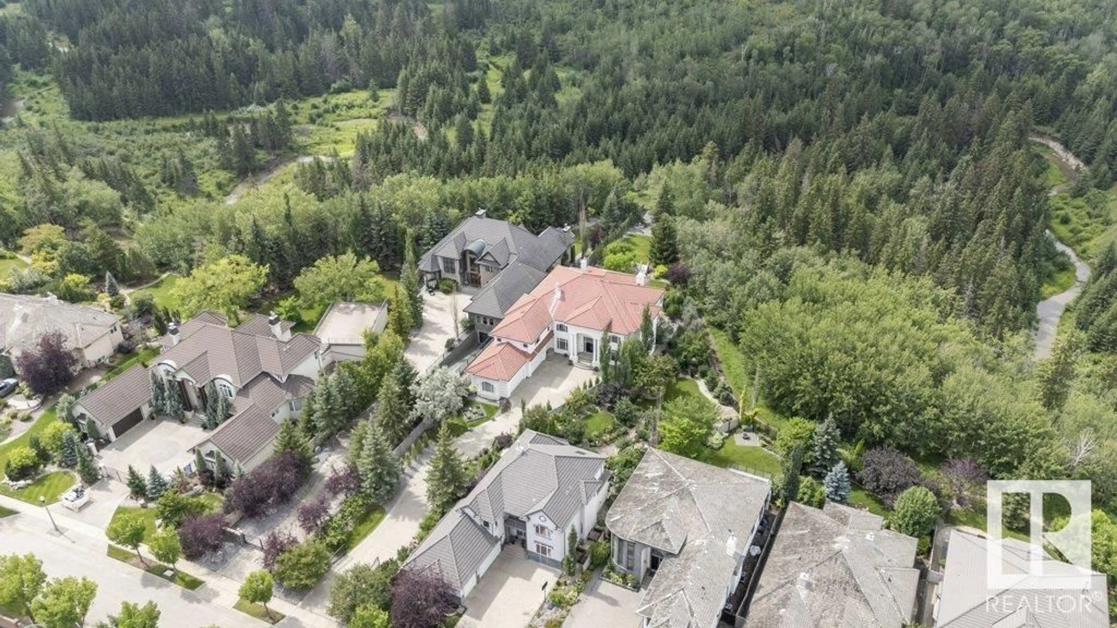 A pic from outside/outdoor area/front of a property/back of a property/a pic from drone, forest/trees view for 1128 119 ST, Edmonton Alberta T6J7H7