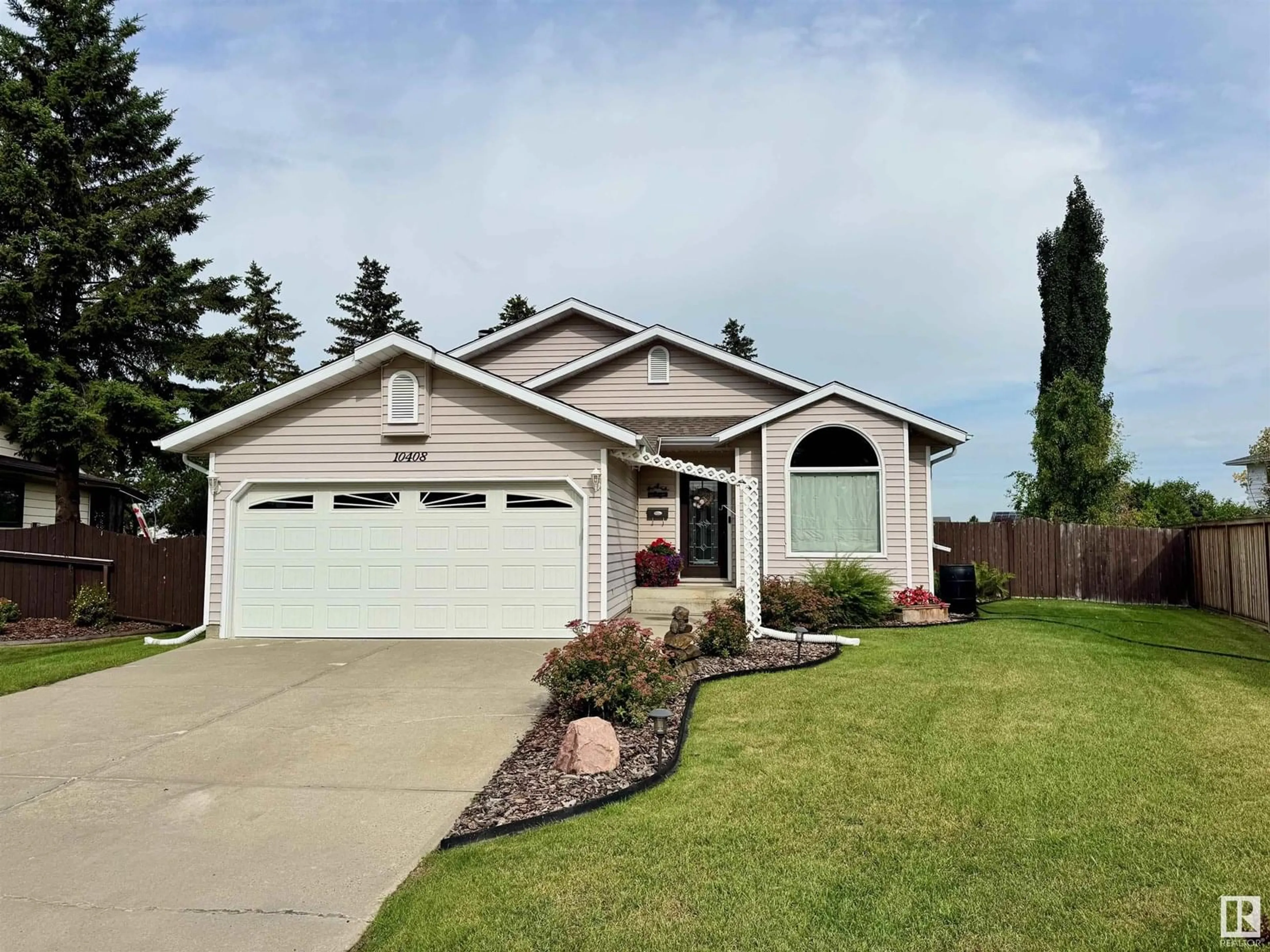 Home with vinyl exterior material, street for 10408 89 ST, Morinville Alberta T8R1C6