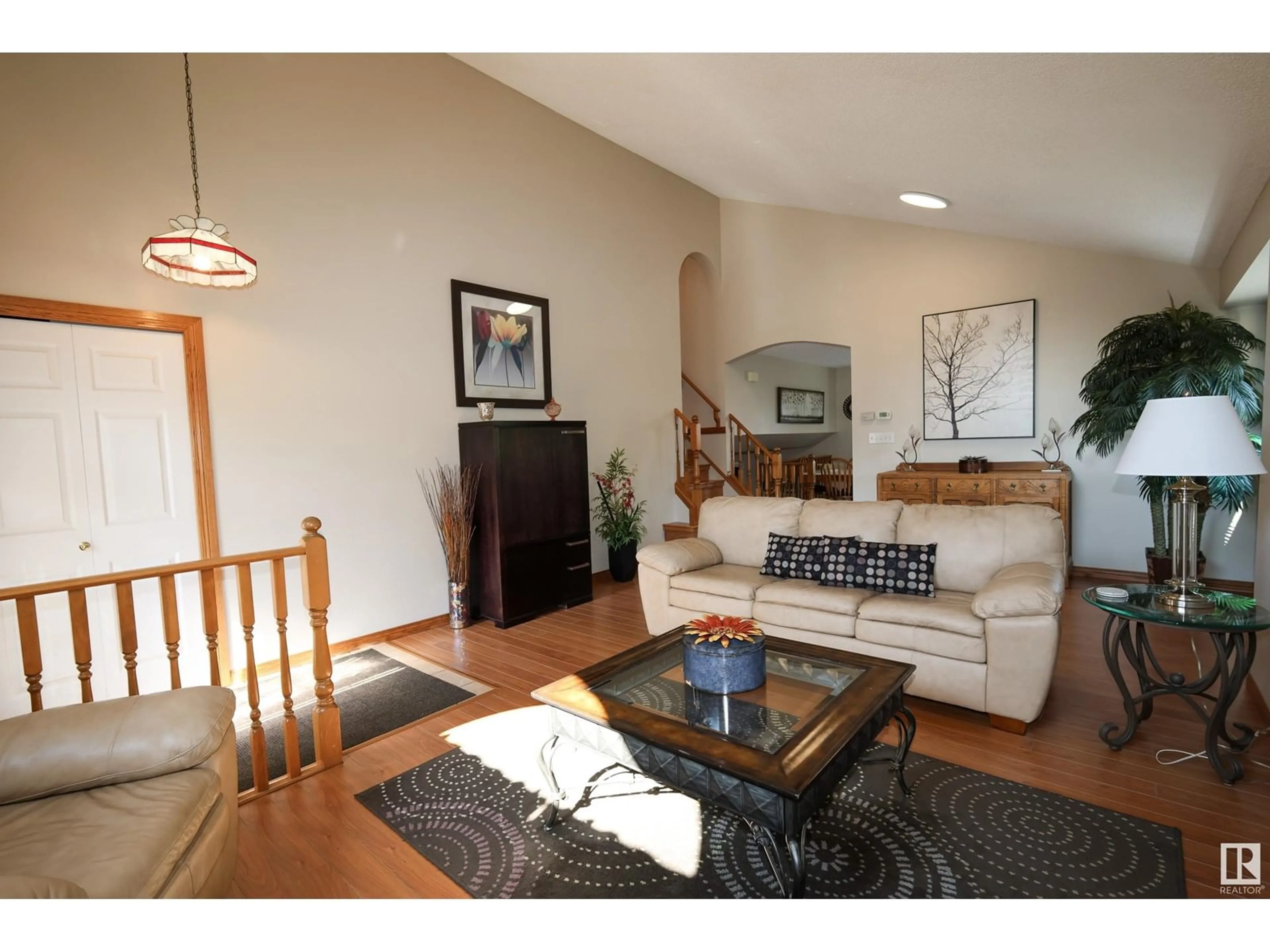 Living room with furniture, wood/laminate floor for 10408 89 ST, Morinville Alberta T8R1C6