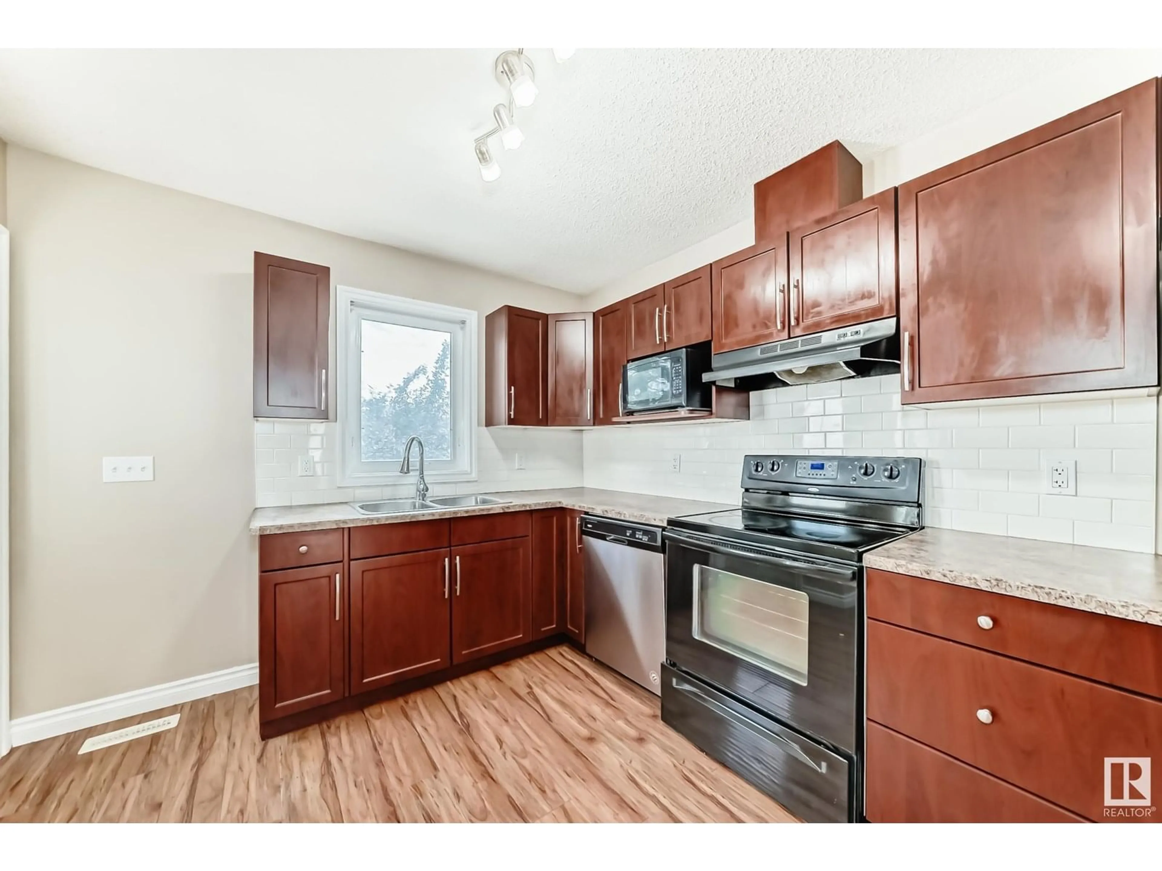 Standard kitchen, wood/laminate floor for 171 - 51 BRINTNELL BV, Edmonton Alberta T5Y0C6