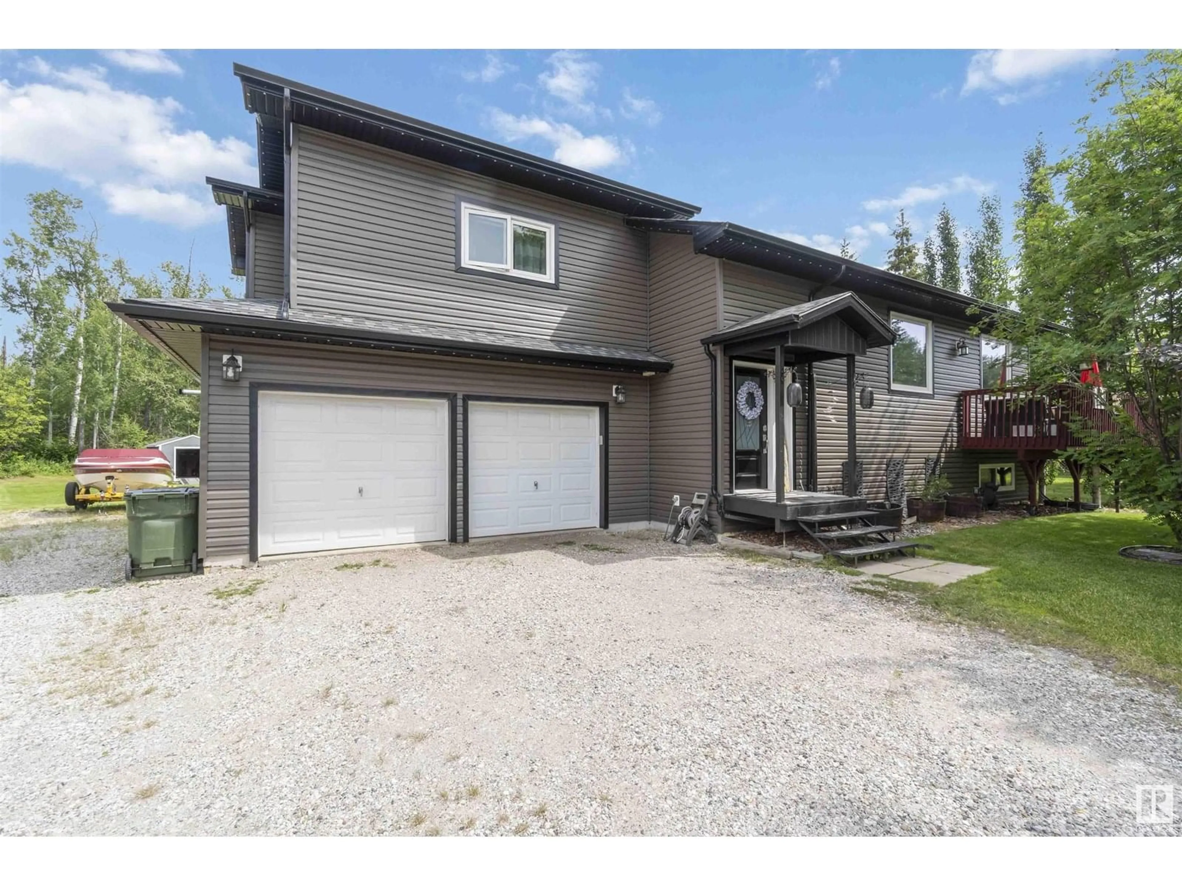 Home with vinyl exterior material, street for 4812 49A AV, Rural Lac Ste. Anne County Alberta T0E0A0