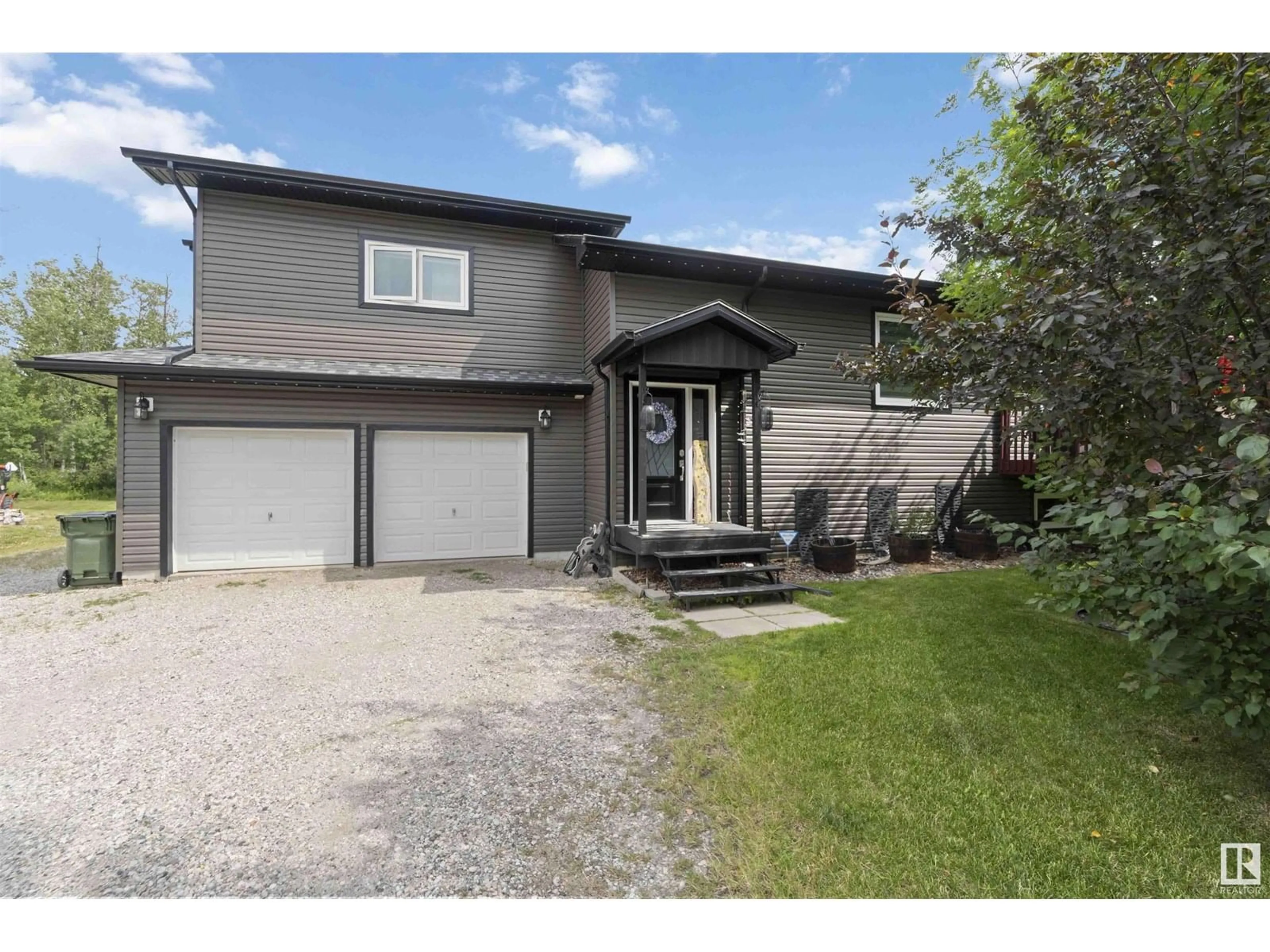 Home with vinyl exterior material, street for 4812 49A AV, Rural Lac Ste. Anne County Alberta T0E0A0