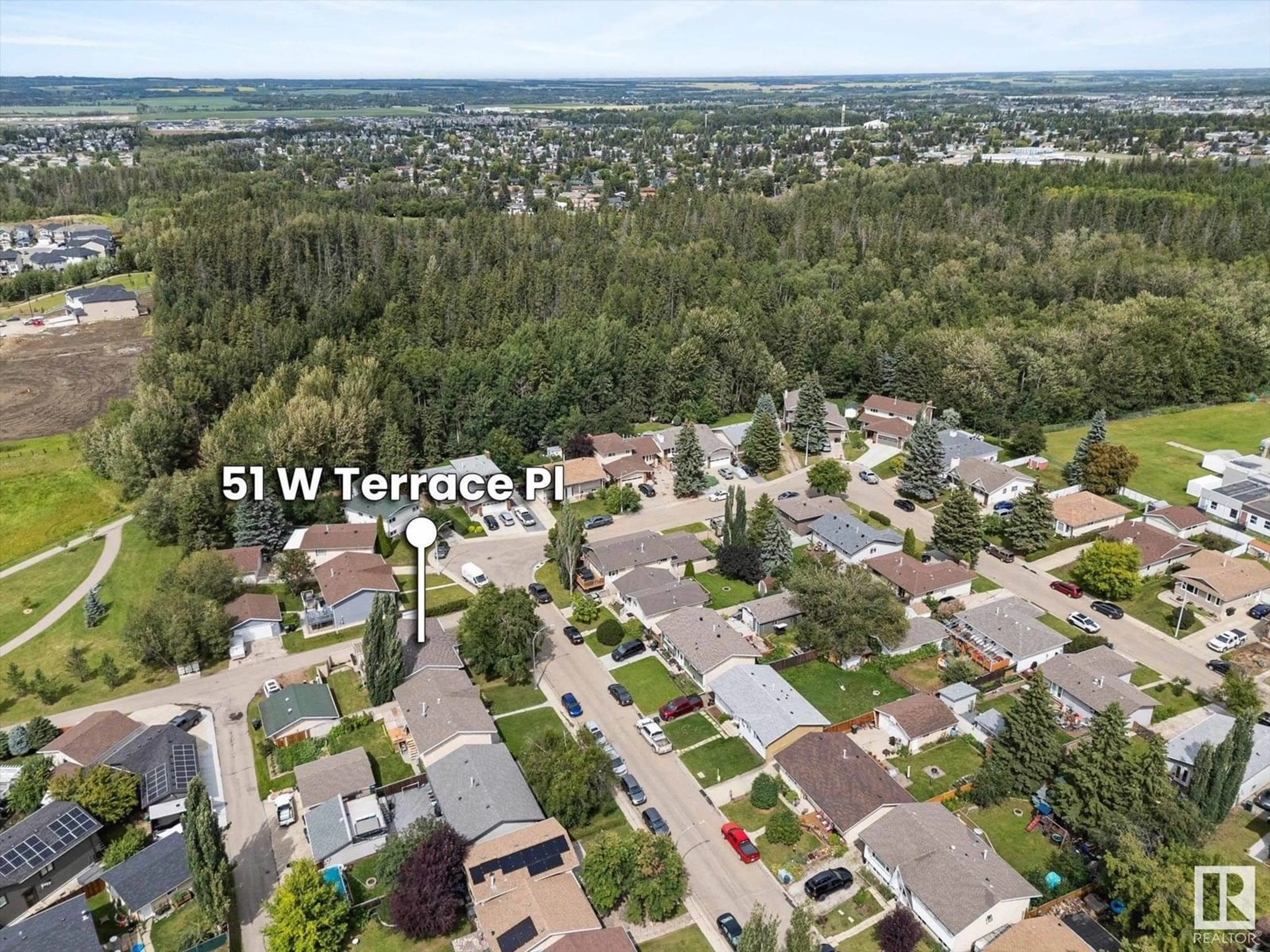 A pic from outside/outdoor area/front of a property/back of a property/a pic from drone, forest/trees view for 51 WEST TERRACE PL, Spruce Grove Alberta T7X1T4