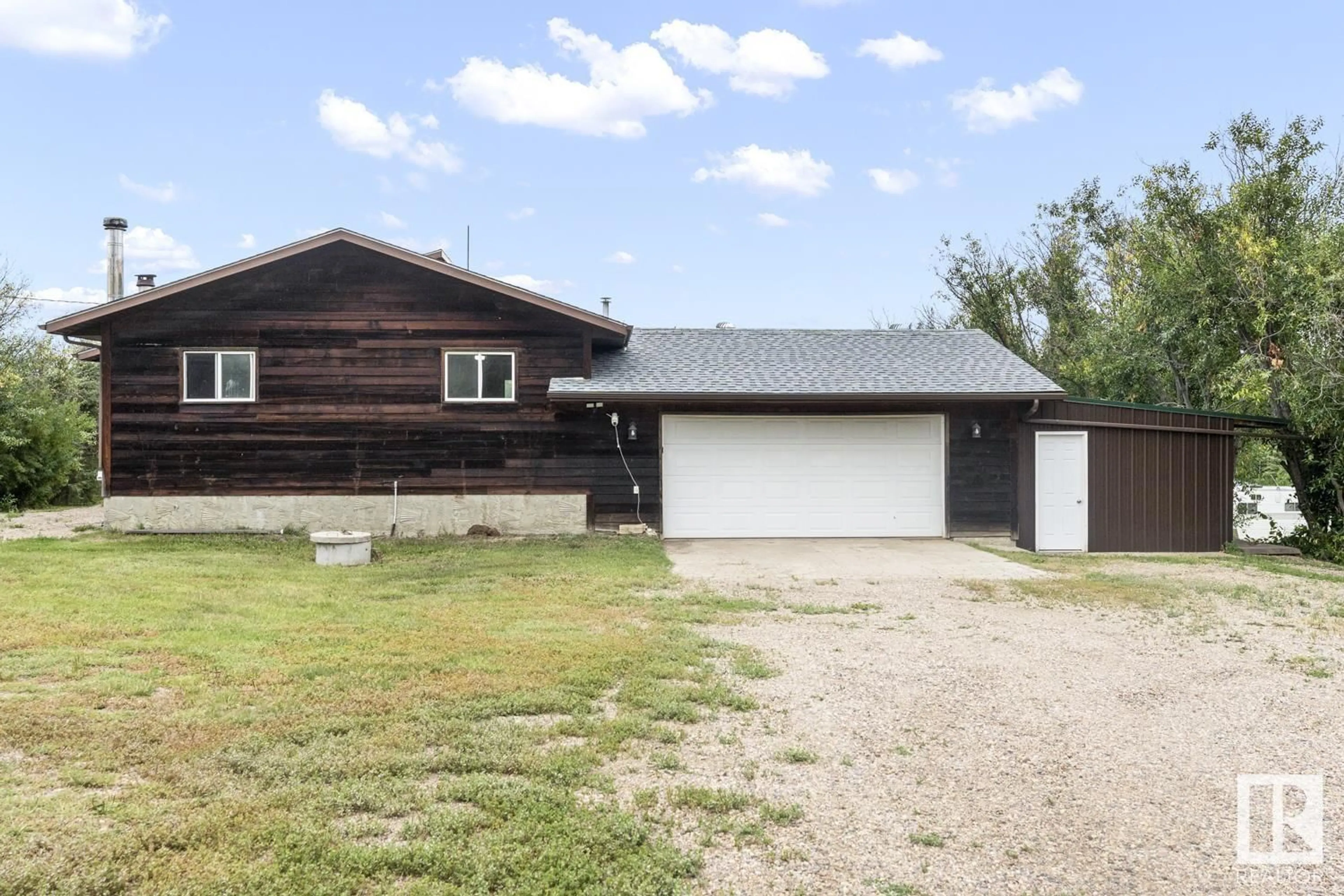A pic from outside/outdoor area/front of a property/back of a property/a pic from drone, street for 260 - 57201 RNG RD, Rural St. Paul County Alberta T0A3A0