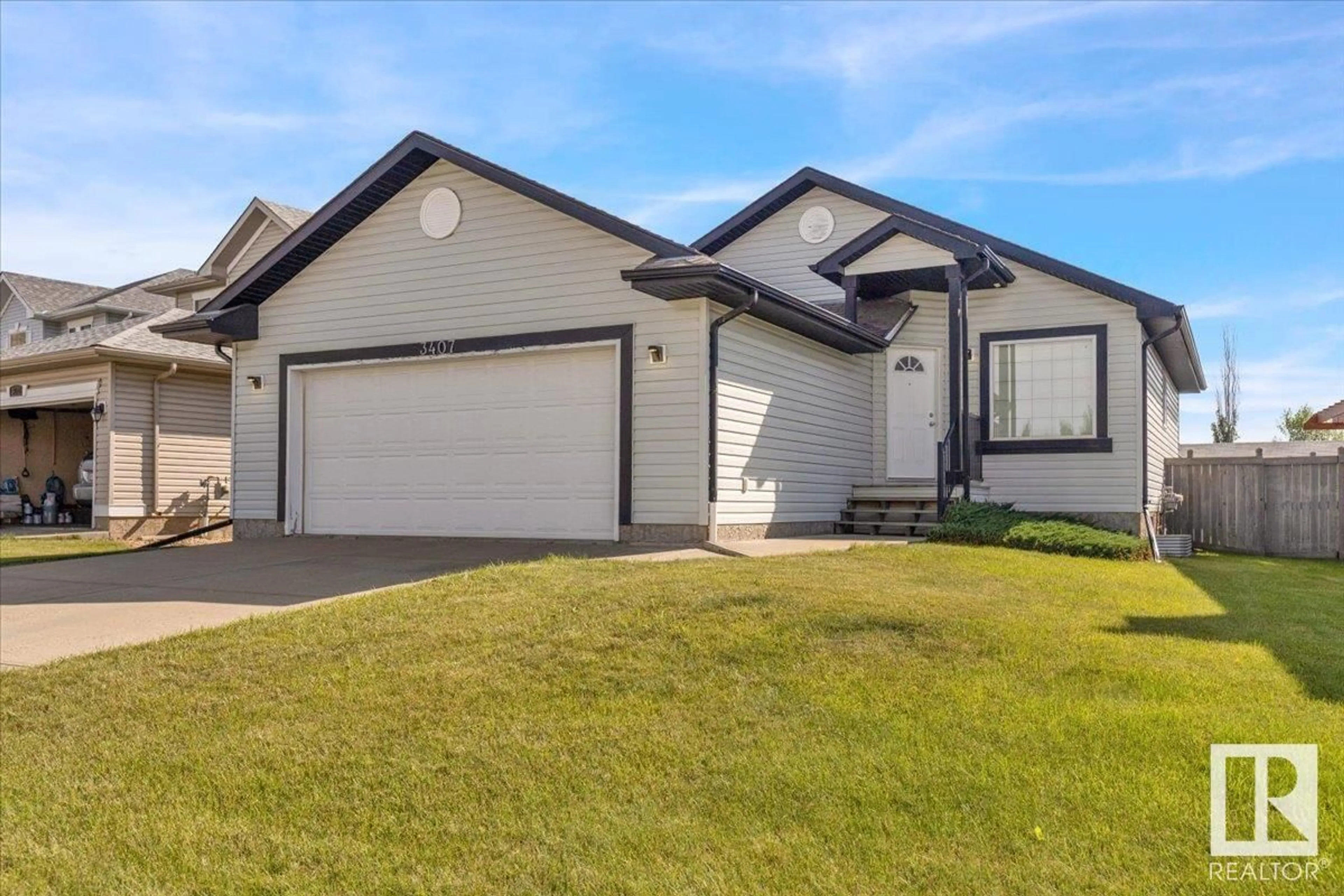 Home with vinyl exterior material, street for 3407 25 ST, Edmonton Alberta T6T0B1