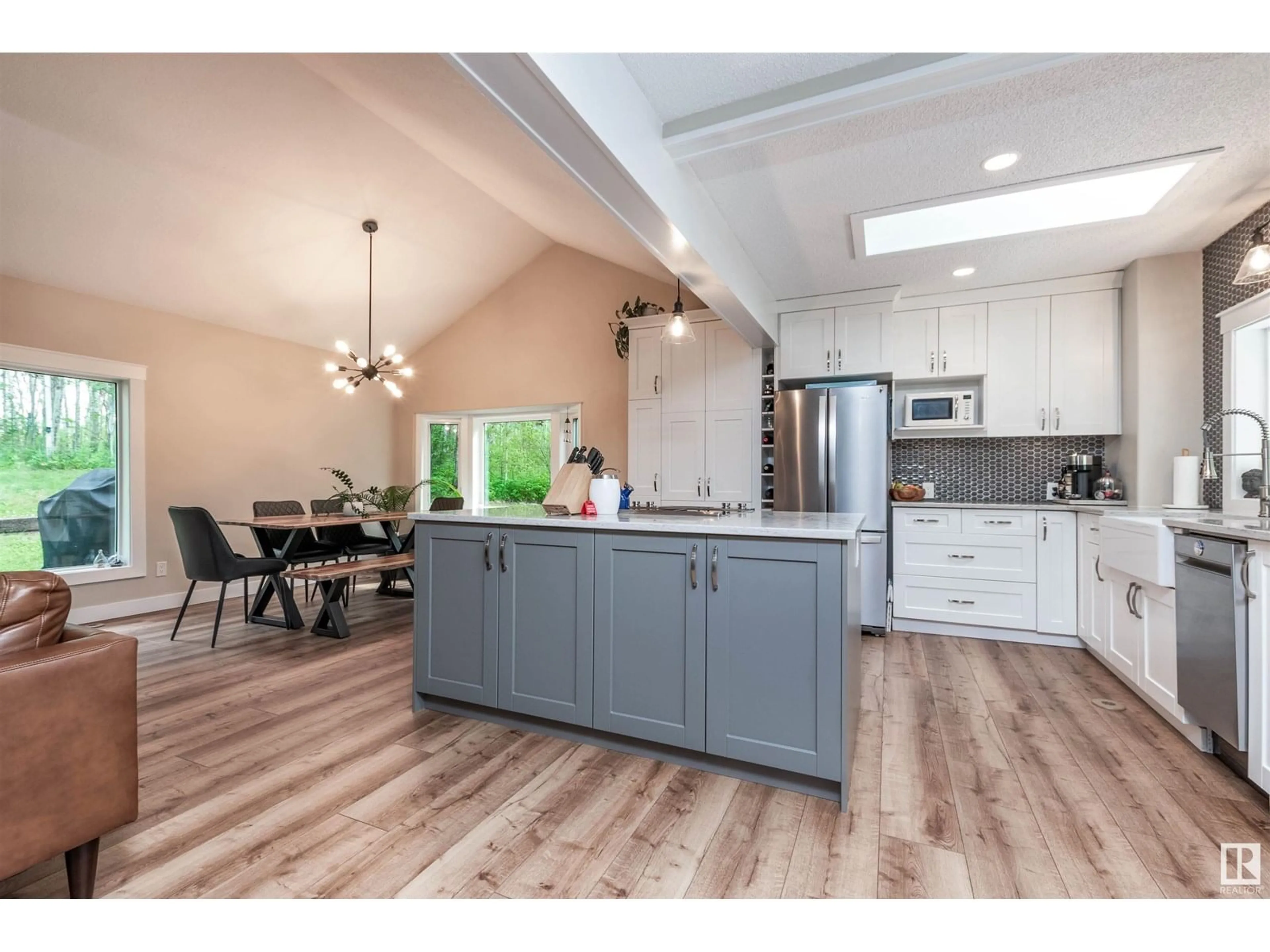 Open concept kitchen, wood/laminate floor for 50529 RGE ROAD 21, Rural Parkland County Alberta T7Y2N4