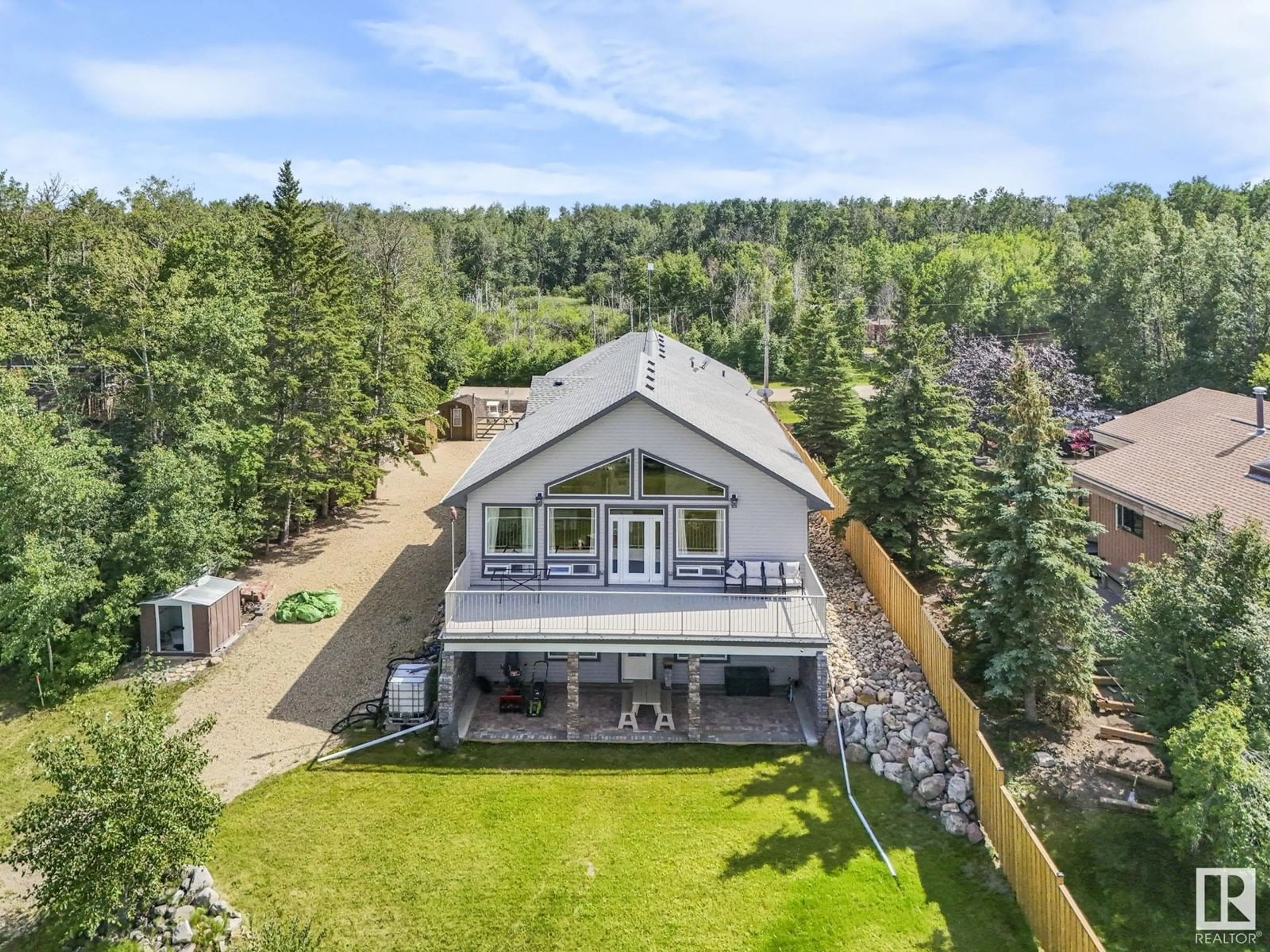 A pic from outside/outdoor area/front of a property/back of a property/a pic from drone, unknown for #17 - 51263 RANGE ROAD 204, Rural Strathcona County Alberta T8G1E9