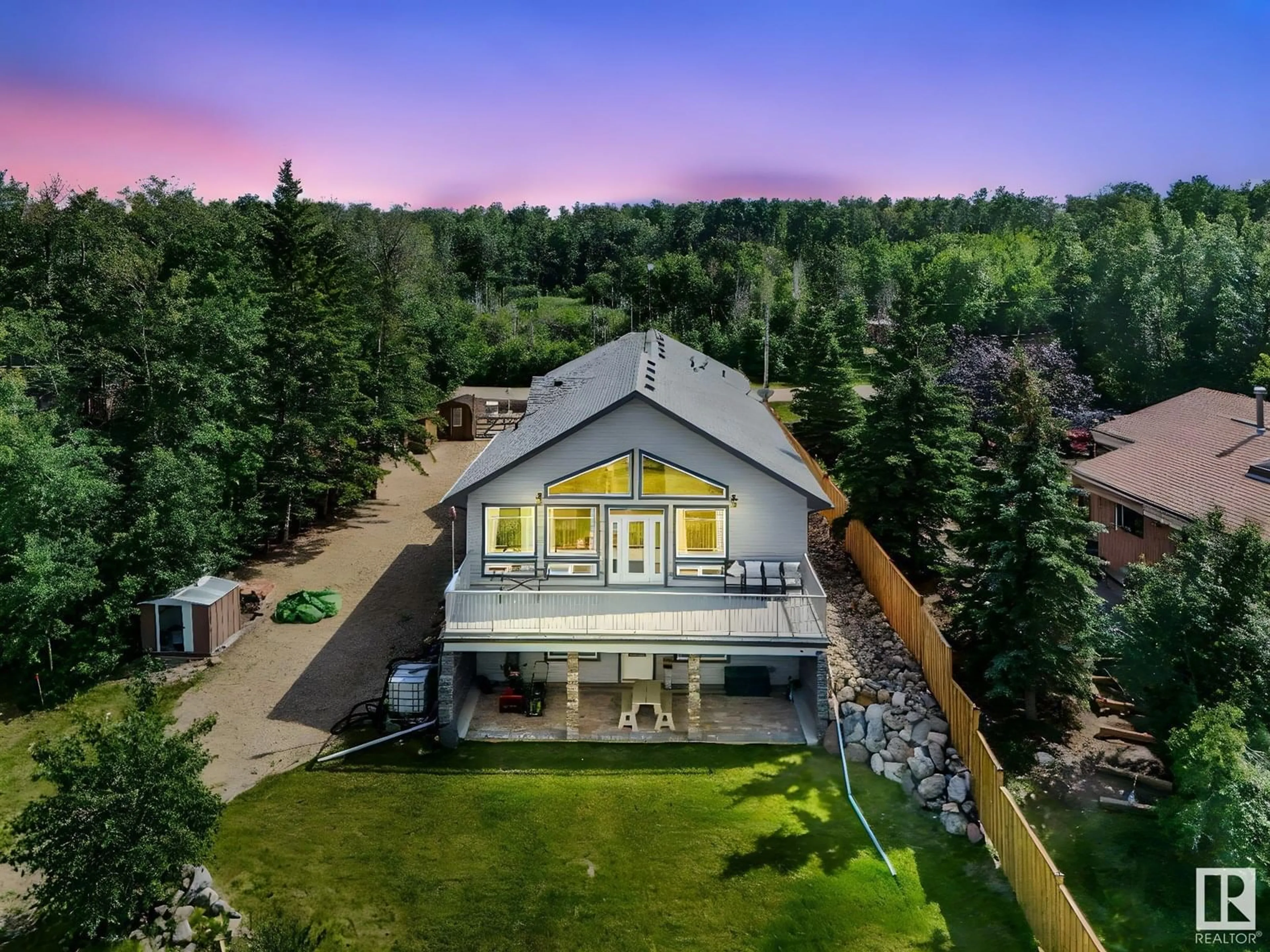 A pic from outside/outdoor area/front of a property/back of a property/a pic from drone, mountain view for #17 - 51263 RANGE ROAD 204, Rural Strathcona County Alberta T8G1E9