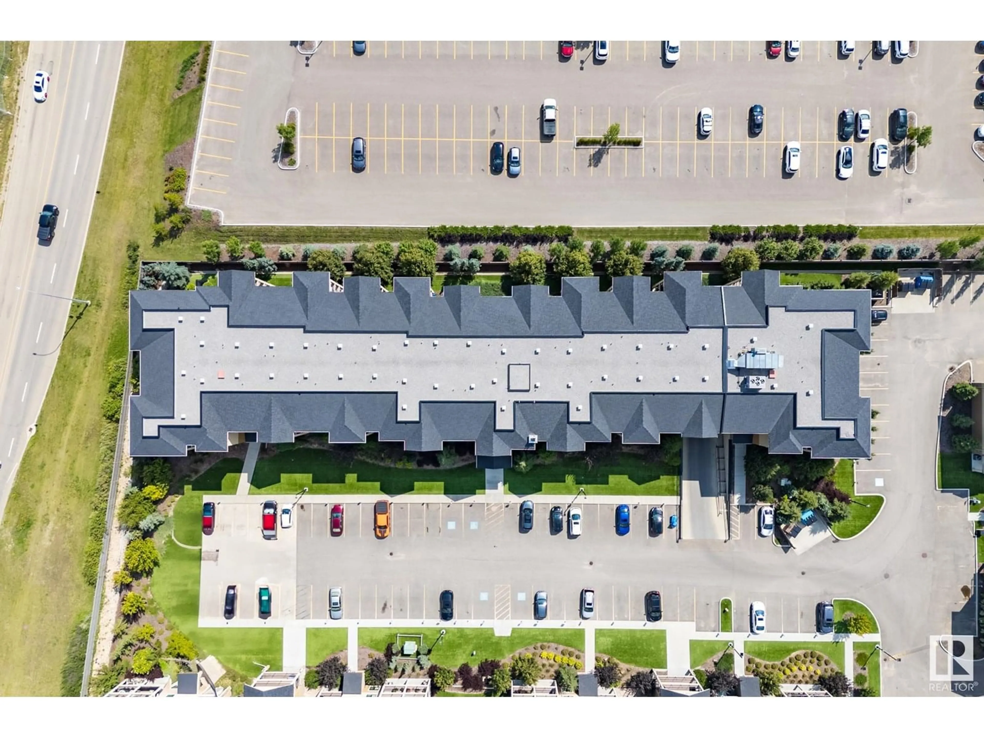 A pic from outside/outdoor area/front of a property/back of a property/a pic from drone, street for 401 - 1031 173 ST, Edmonton Alberta T6W3E4