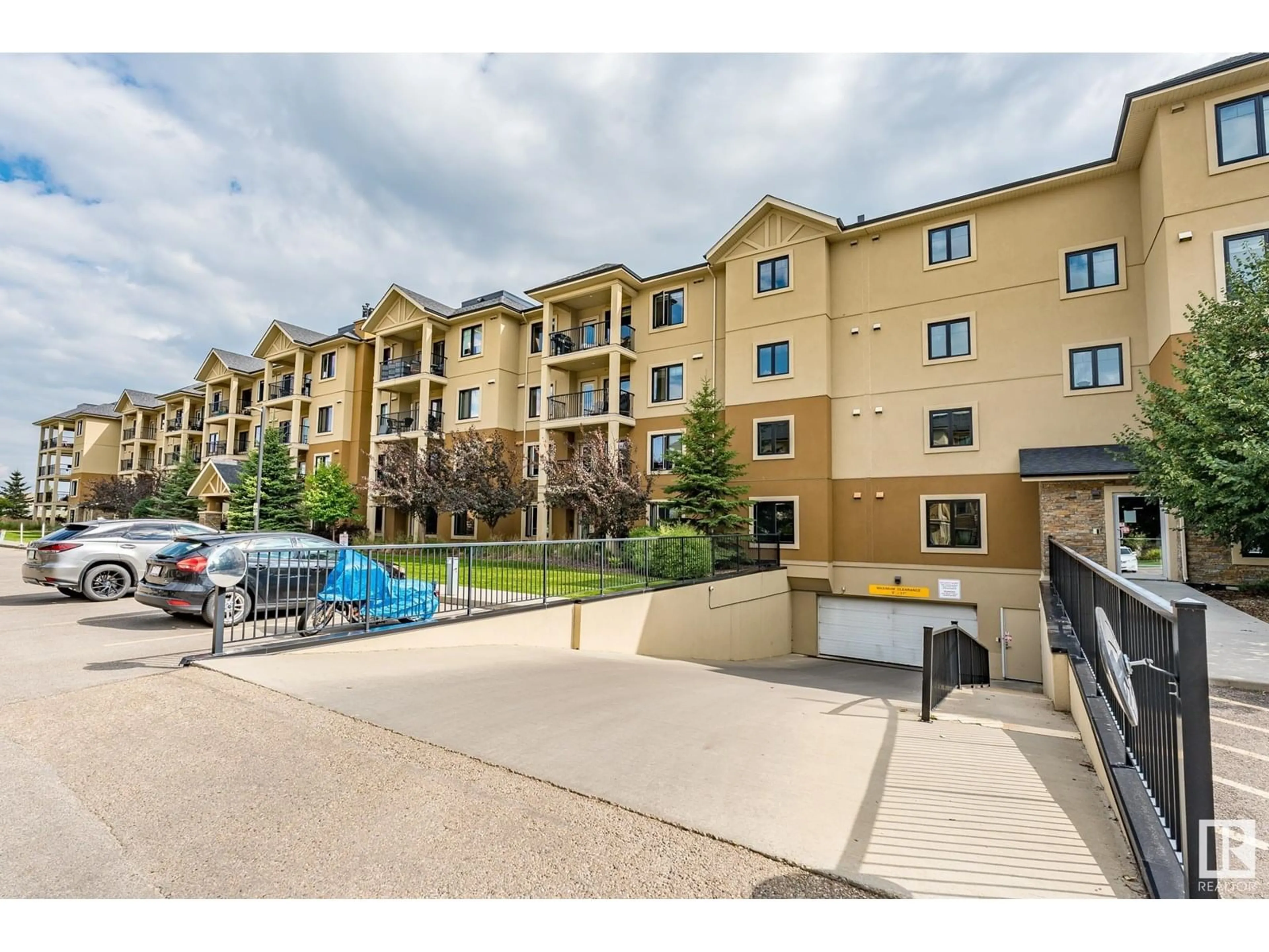 A pic from outside/outdoor area/front of a property/back of a property/a pic from drone, unknown for 401 - 1031 173 ST, Edmonton Alberta T6W3E4